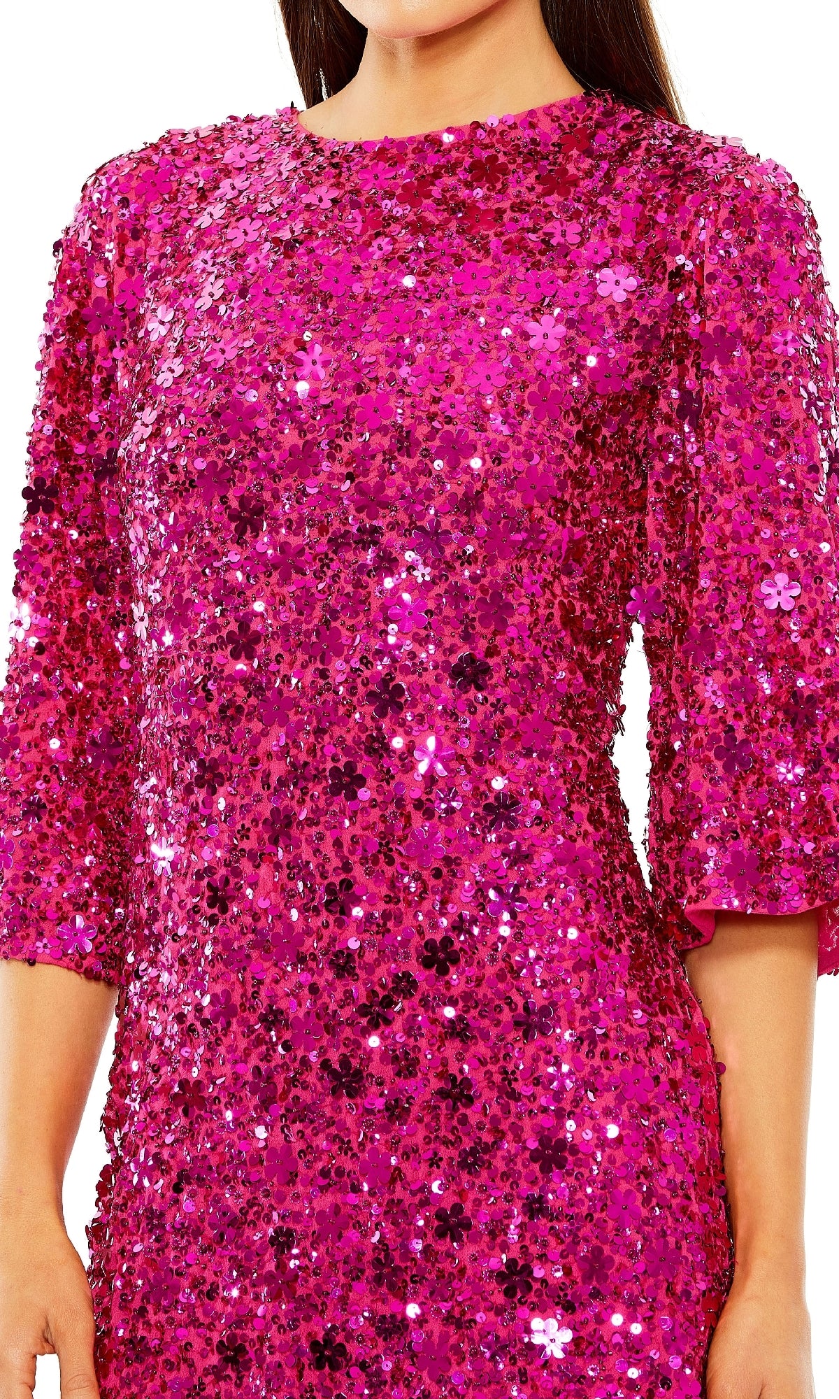 A person wearing the Mac Duggal 10032 Short Party Dress—a bright pink sequin cocktail dress with three-quarter sleeves and a high neckline.