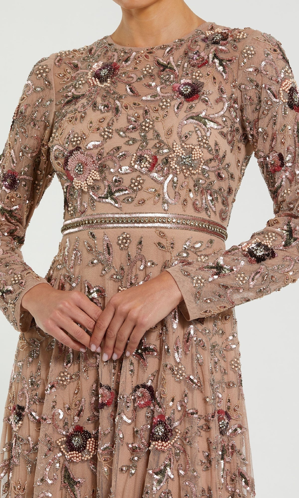 Wearing the Mac Duggal 10093, a beige long sleeve beaded formal dress with intricate floral embroidery, shown from shoulders to knees.