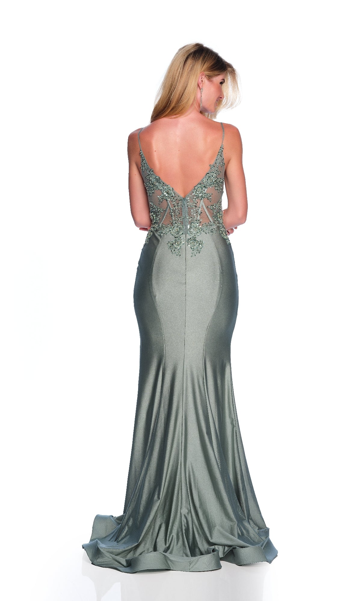 A woman stands facing away against a white background, wearing the Sheer-Waist Long Prom Dress: Dave & Johnny A10442—a silver-green, floor-length mermaid gown with lace detailing and a deep V-back.