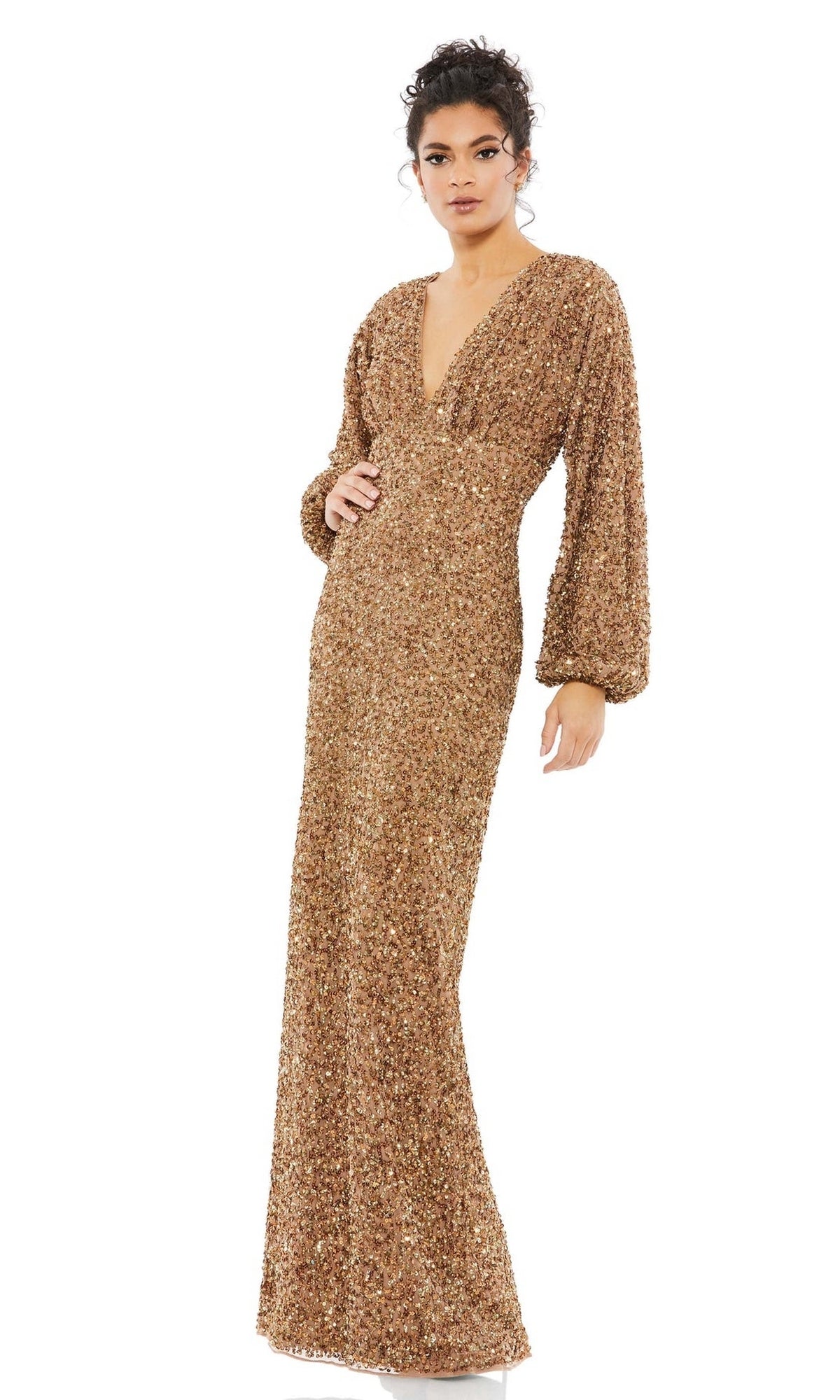 A woman wearing the Mac Duggal 10791 Sequin Long Sleeve Formal Gown with a deep V-neckline stands against a plain white background.