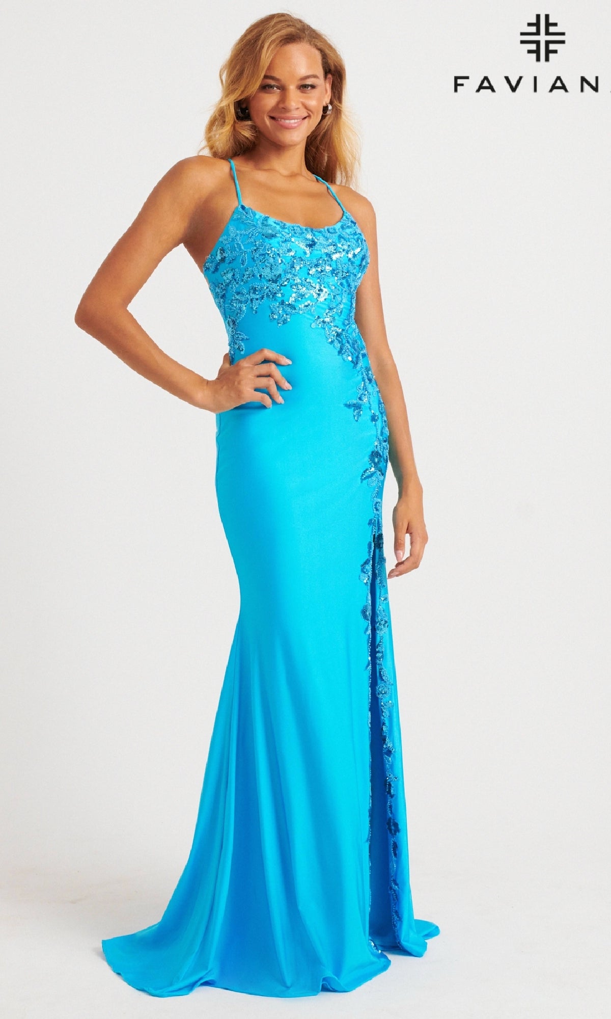 A woman smiles against a white background, wearing the Faviana Tonal-Embroidered Long Prom Dress 11017 in bright blue with sequin details. The