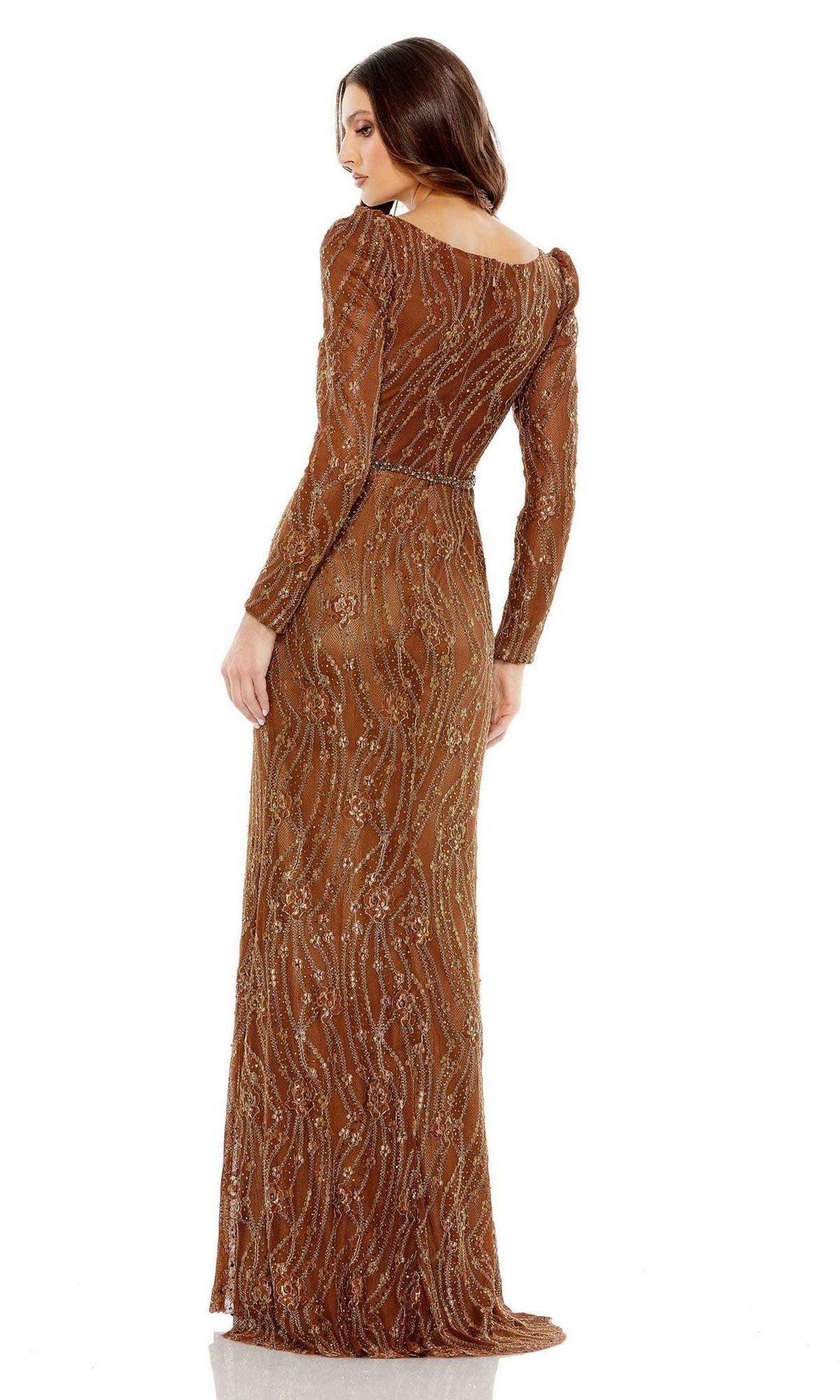 A woman models the Long Formal Dress 11159 by Mac Duggal, a brown sequined long sleeve evening gown, standing against a plain white background and gazing over her shoulder.