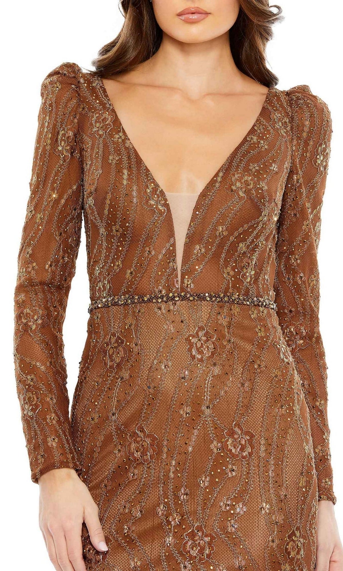 A woman wears the Mac Duggal Long Formal Dress 11159, a long-sleeve brown gown with a deep V-neck, intricate beading, sequin accents, and stunning formal elegance.