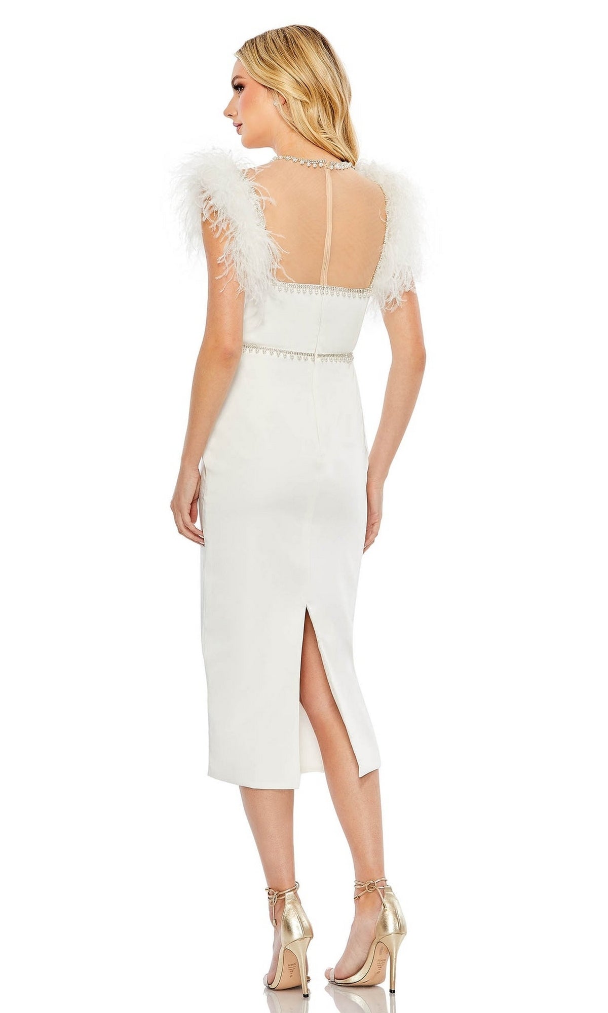 Woman in the Sheer High-Neck Wedding-Guest Dress, Mac Duggal 11438—white, knee-length with feathered short sleeves and a back slit—stands in gold heels, facing away from the camera.
