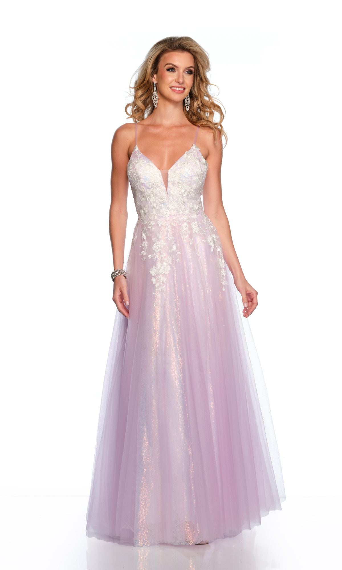 A woman wears the Long Formal Dress 11585 by Dave and Johnny, a lilac ball gown with a fitted lace bodice adorned with delicate embroidery and a flowing tulle skirt, standing against a white background.