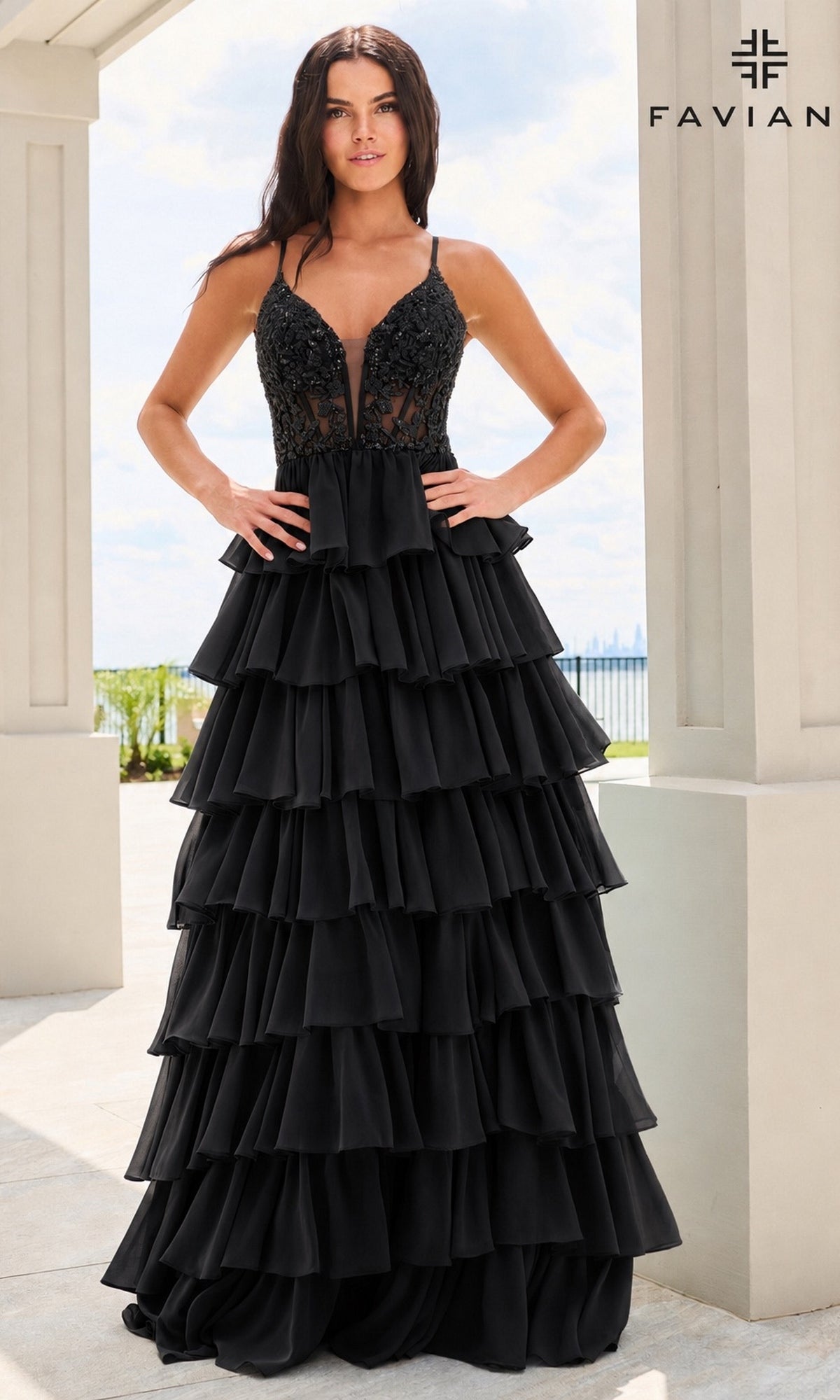 Faviana 11603 black floor-length gown featuring a beaded corset bodice with a plunging neckline and a multi-tiered chiffon ruffled skirt.