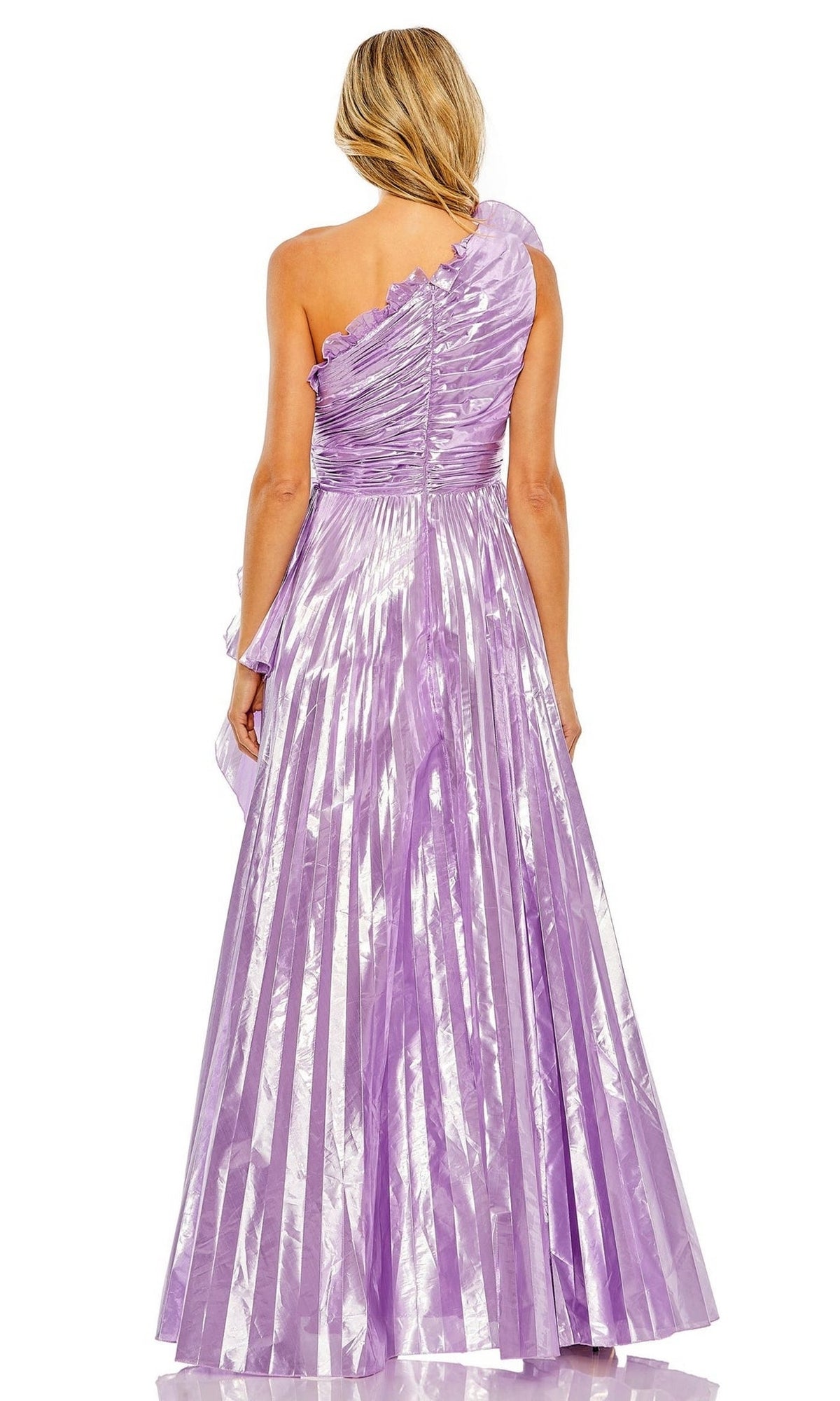 A woman stands with her back to the camera, wearing the Long Formal Dress 11696 by Mac Duggal—a shiny lilac one-shoulder gown with a fitted bodice and flowing pleated skirt.