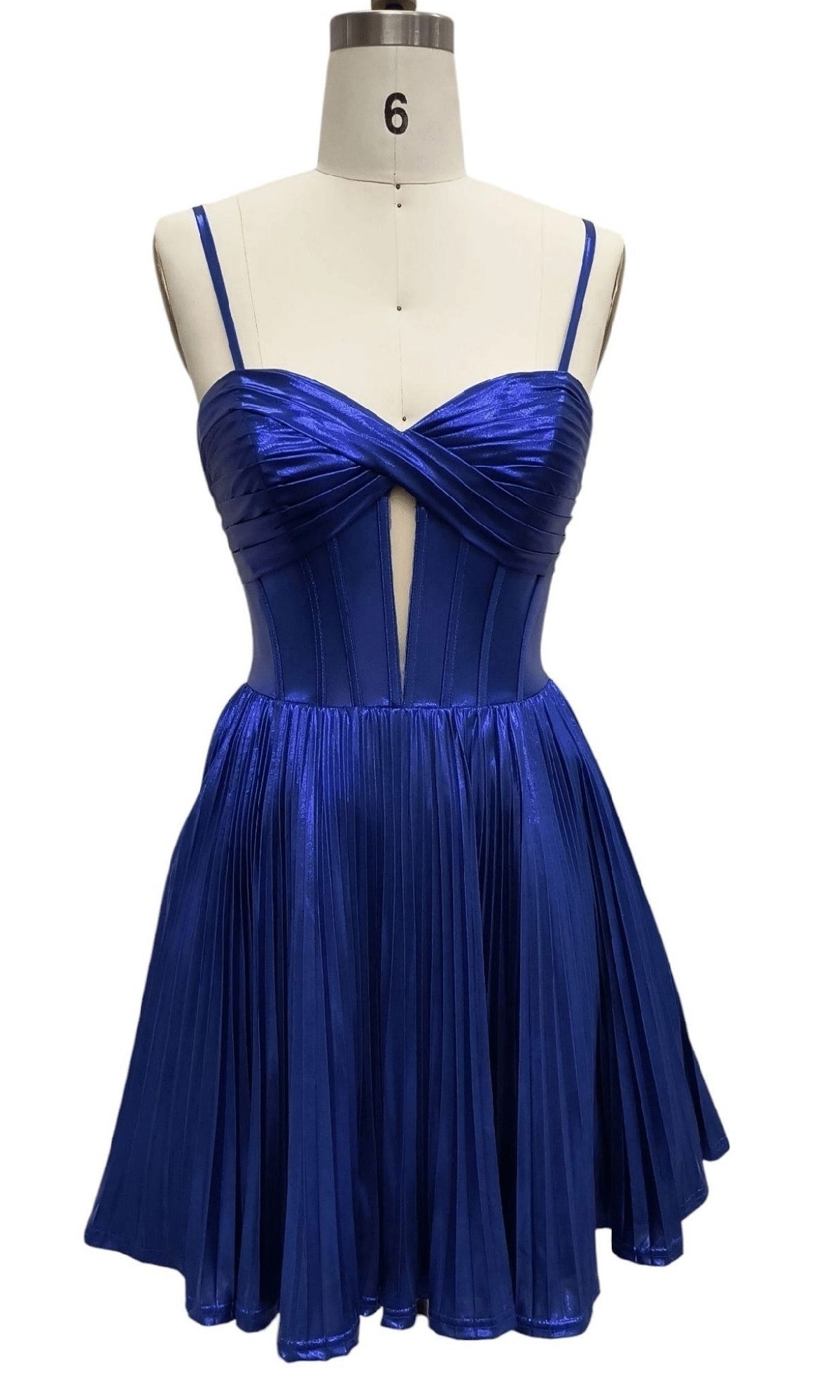 A mannequin showcases the Royal Blue Short Hoco Dress: 12388, a sleeveless metallic blue A-line dress with spaghetti straps, fitted bodice, and front cut-out—perfect for homecoming or parties.
