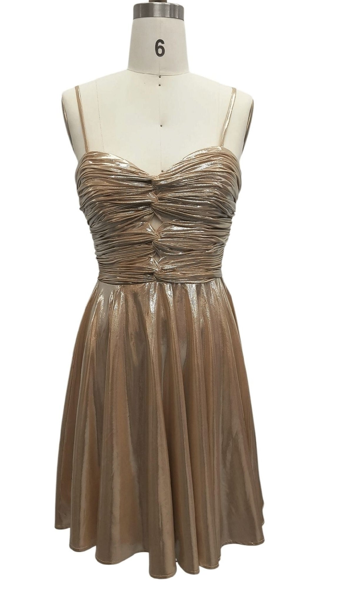 Metallic Short Hoco Dress: 12514—a gold sleeveless A-line dress with thin straps, ruched bodice, and flared skirt, shown on a size 6 dress form; the perfect metallic homecoming look.