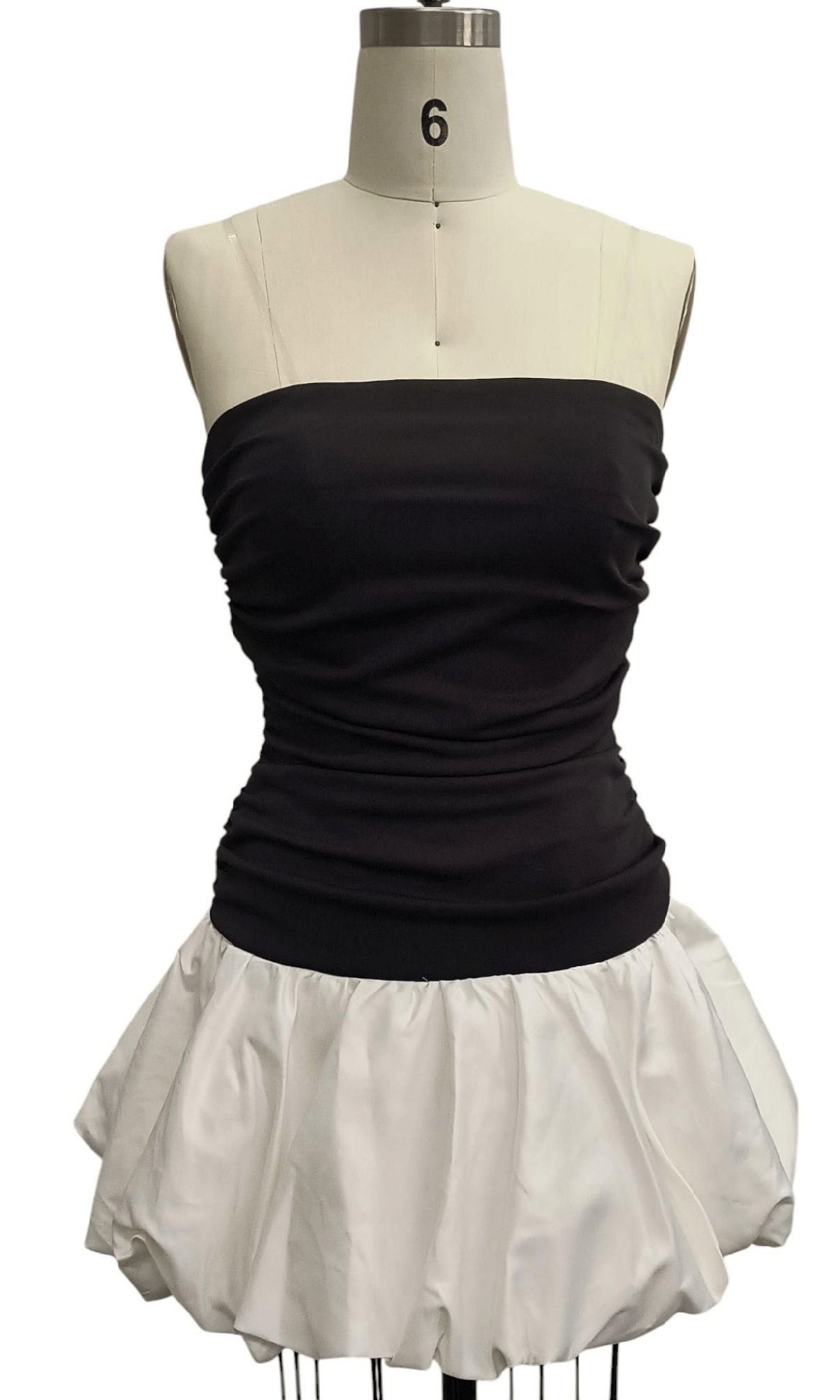 The Black and White Hoco Dress: 12656 showcases a strapless black ruched top with a voluminous white bubble skirt, making it a chic black and white party dress perfect for homecoming.