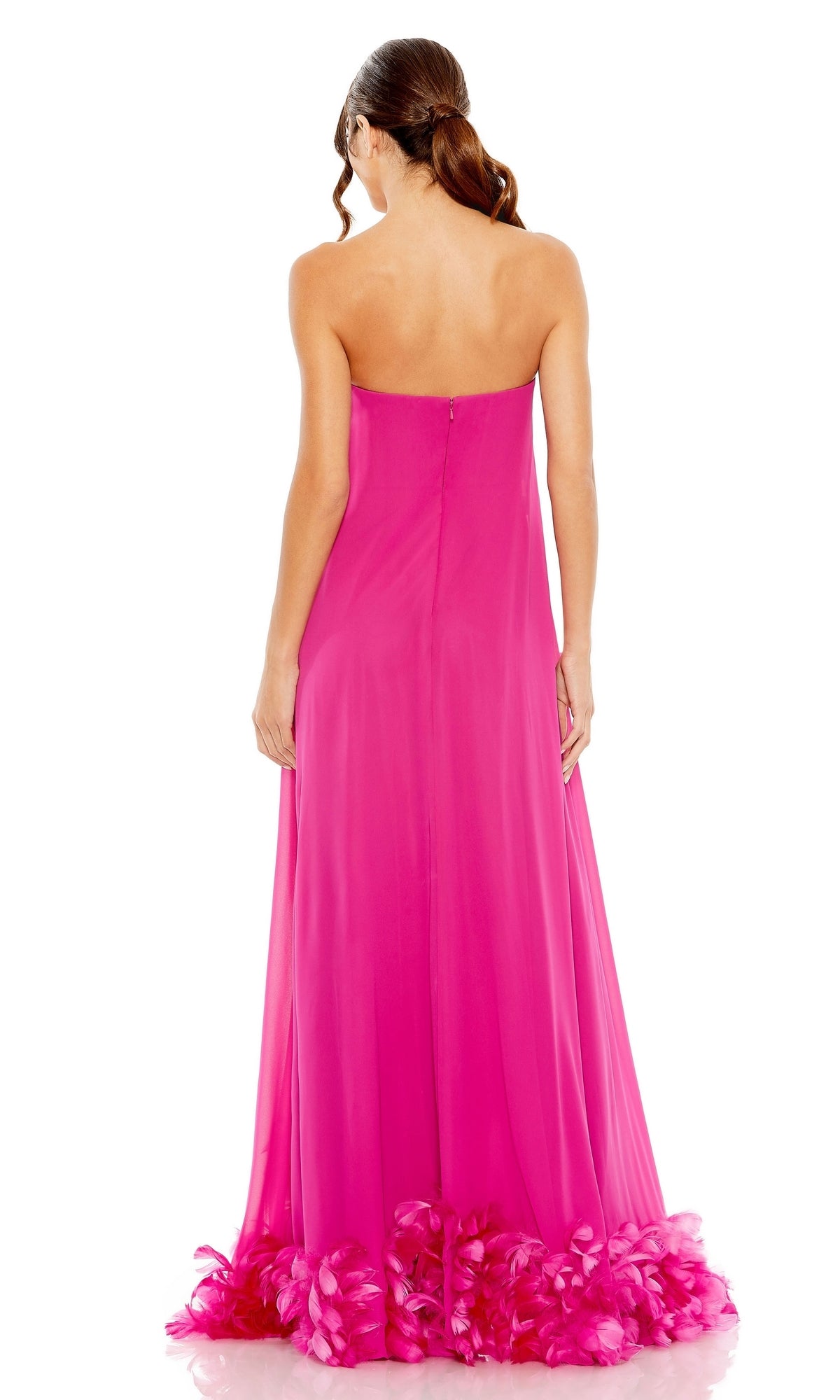Woman in a strapless, floor-length hot pink Mac Duggal 13001 Trapeze Formal Gown with feathered hem, shown from the back.
