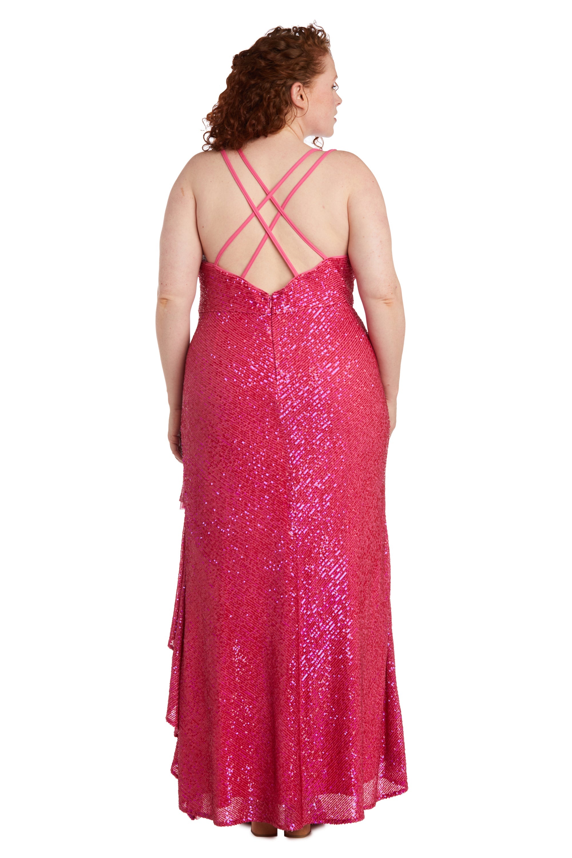 A person with curly hair models the Morgan 13029WM long plus-size sequin prom dress with crisscross straps, shown from the back against a white background.