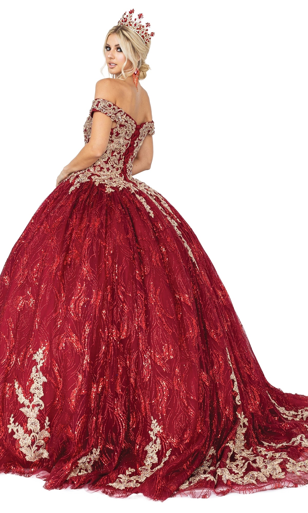 A woman poses against a white background wearing the Burgundy Quinceanera Dress 1579, featuring a sweetheart neckline, ornate full skirt, and matching crown.