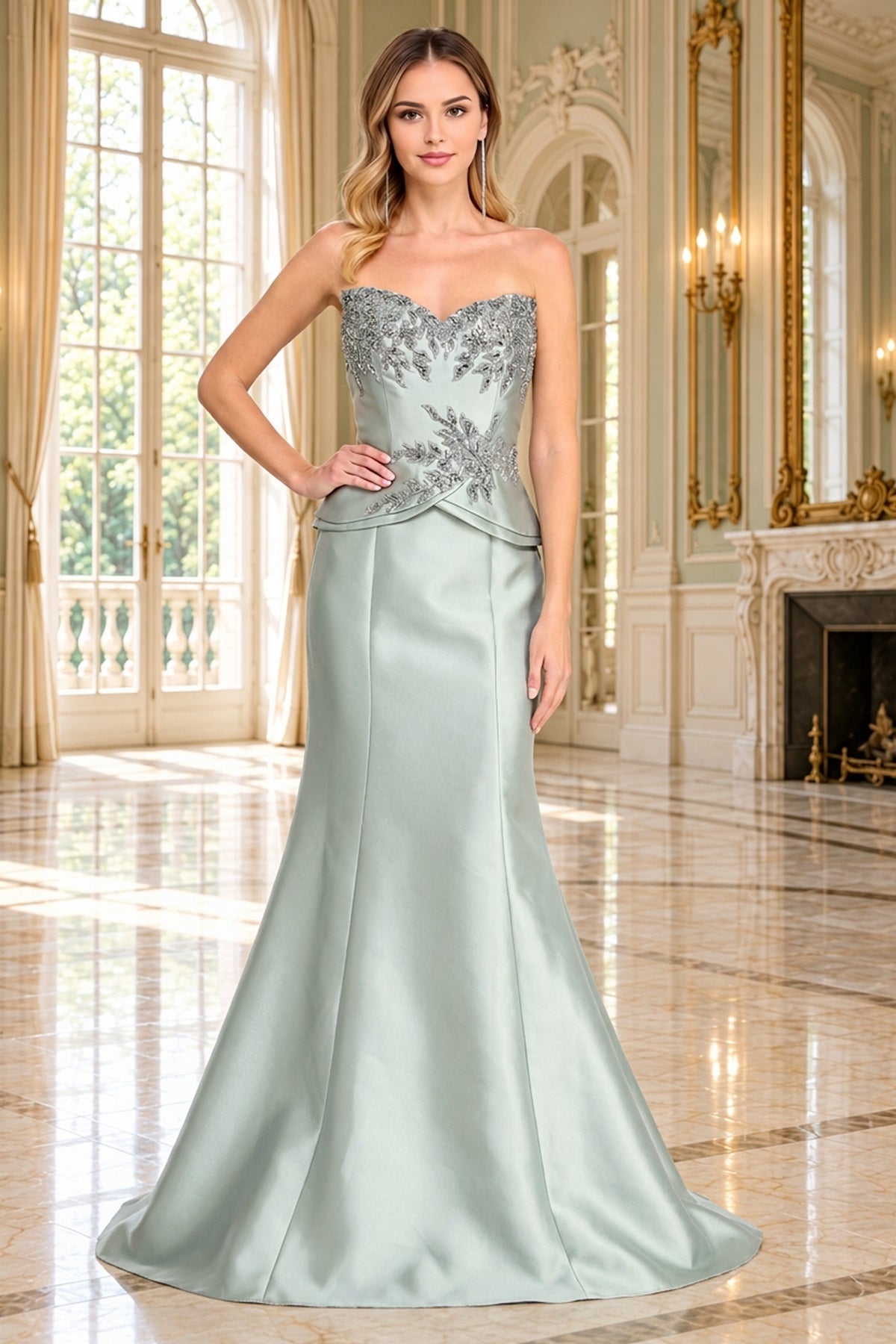 Amelia Couture 2162 sage green strapless evening gown with a sweetheart neckline and silver beaded floral embroidery on the bodice.