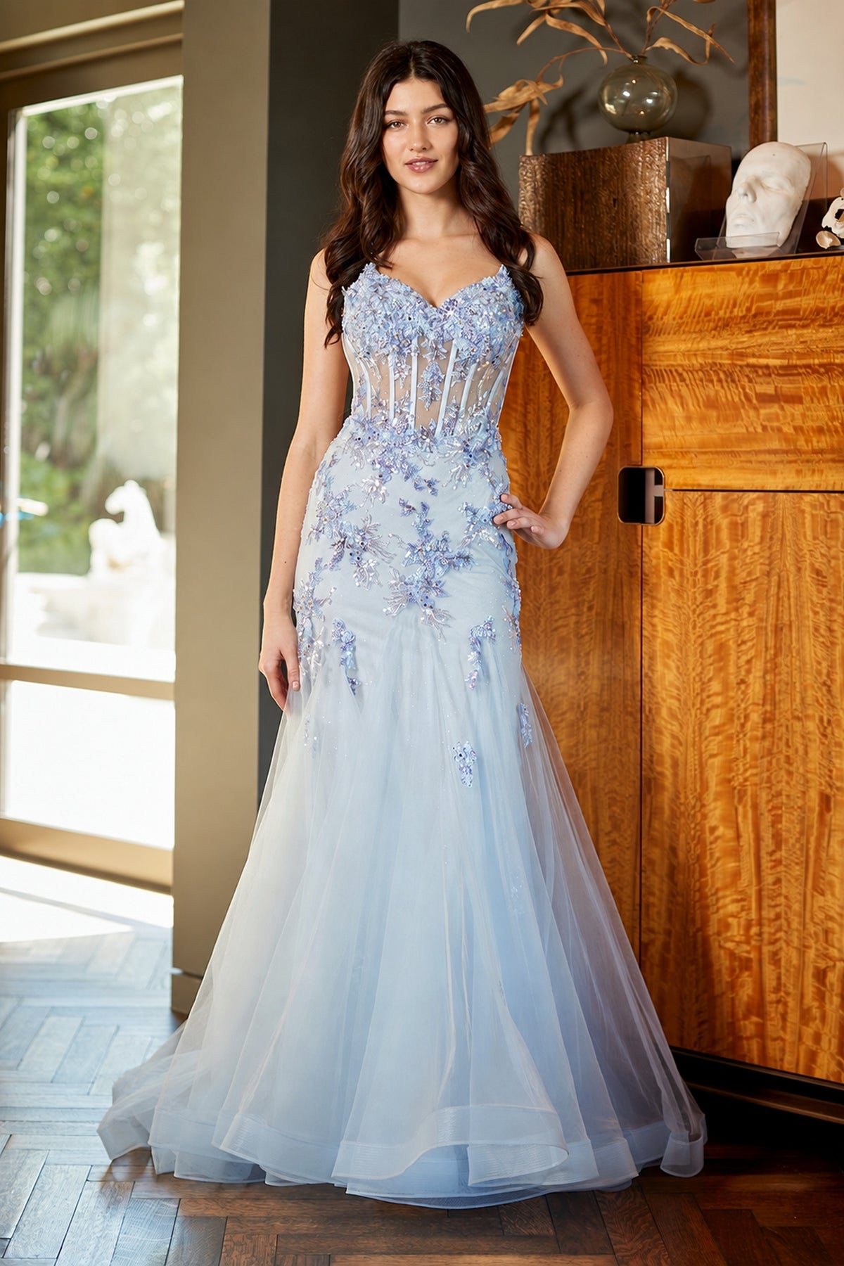 Amelia Couture 2164 long prom dress in pale blue, featuring a floor-length mermaid silhouette, corset bodice, floral embroidery, and sequin flower appliques.