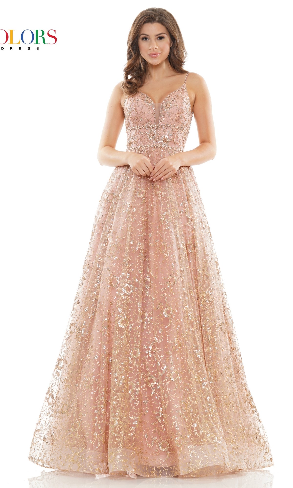 A woman models the Long Glitter Princess Prom Ball Gown 2288—a blush pink, floor-length mesh dress with thin straps and sparkling sequin embellishments—standing against a white background.
