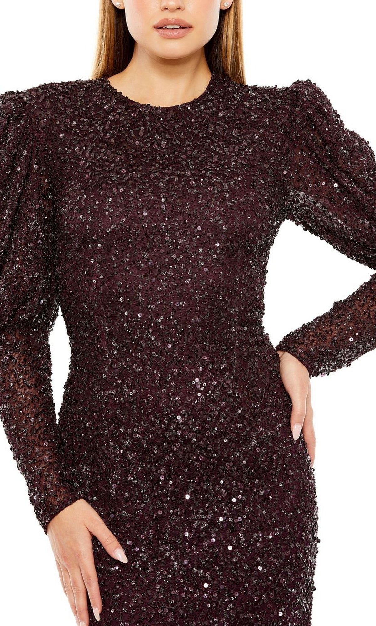 Wearing the Long Formal Dress 24000 by Mac Duggal, a person poses confidently with one hand on their hip against a white background.