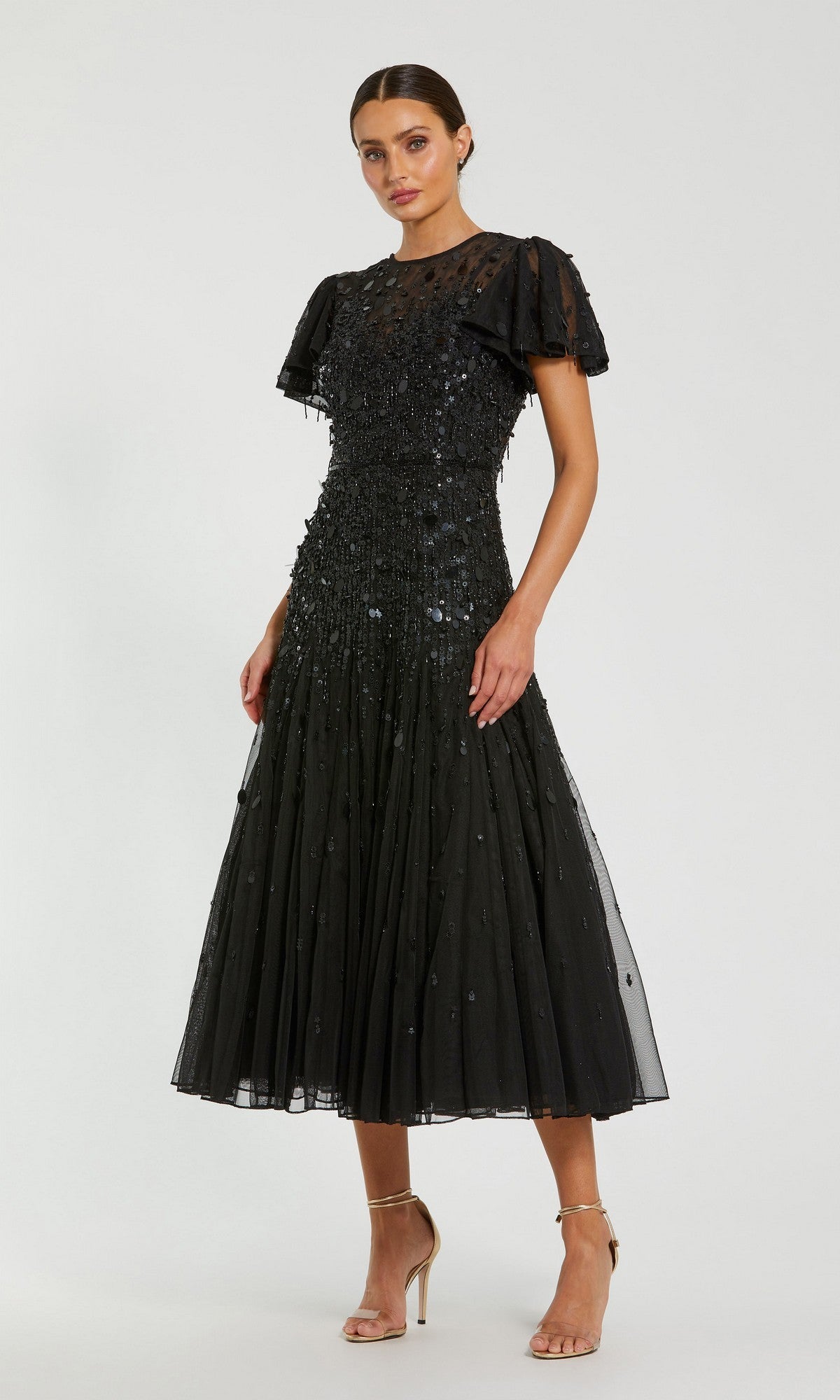 Woman wearing a Mac Duggal 24018 brown tea-length party dress, posing against a plain background.