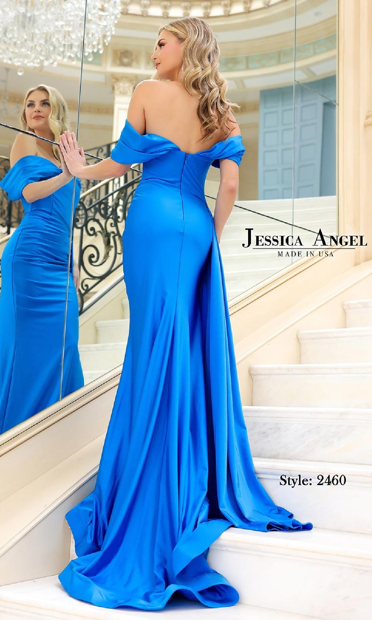 A woman in the Off-Shoulder Long Prom Dress: Jessica Angel 2460 stands on a staircase facing a mirror, the bright blue gown highlighting its elegant design and