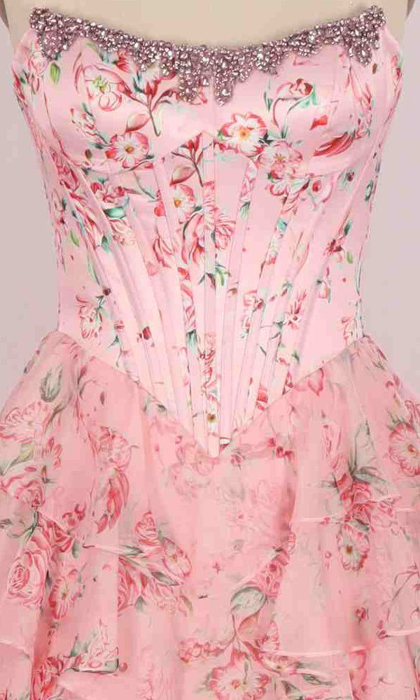 A close-up of the PromGirl Exclusive 250206 long prom dress, featuring a strapless floral print, satin corset bodice, beaded neckline, and tiered ruffled chiffon skirt.