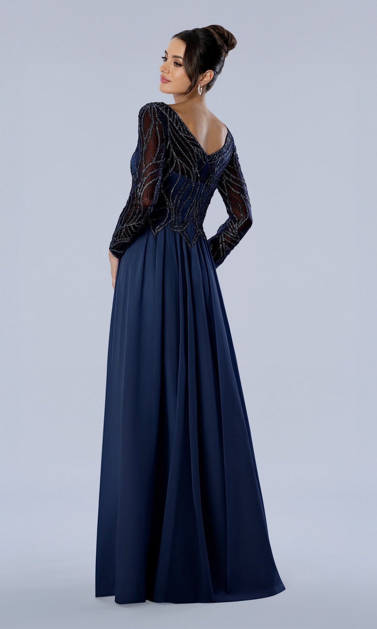 Long Formal Dress: Stella Couture 26364 navy evening gown with a beaded bodice and a full-length, pleated skirt.