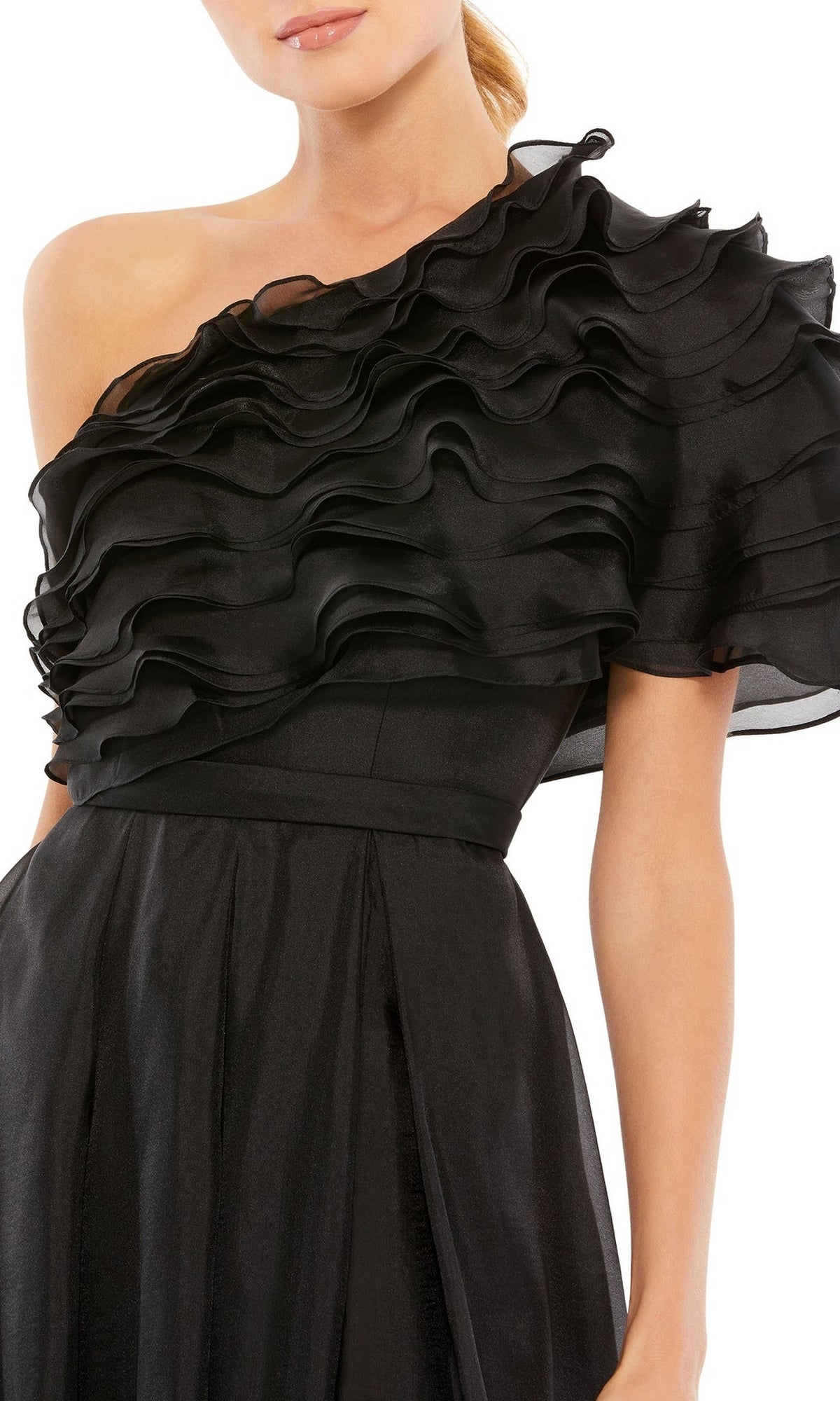 A woman wears the Mac Duggal 26527, a black one-shoulder formal dress featuring layered ruffle detailing across the bodice and sleeve, perfect for special occasions.