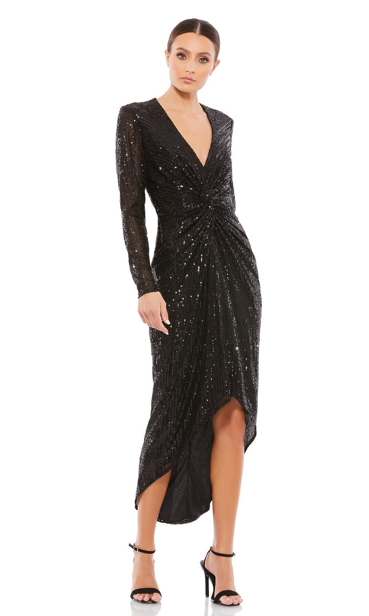 Woman wearing a Mac Duggal Rose Gold Midi Sequin Party Dress 26549 with long sleeves and sequins, paired with black high-heeled sandals.