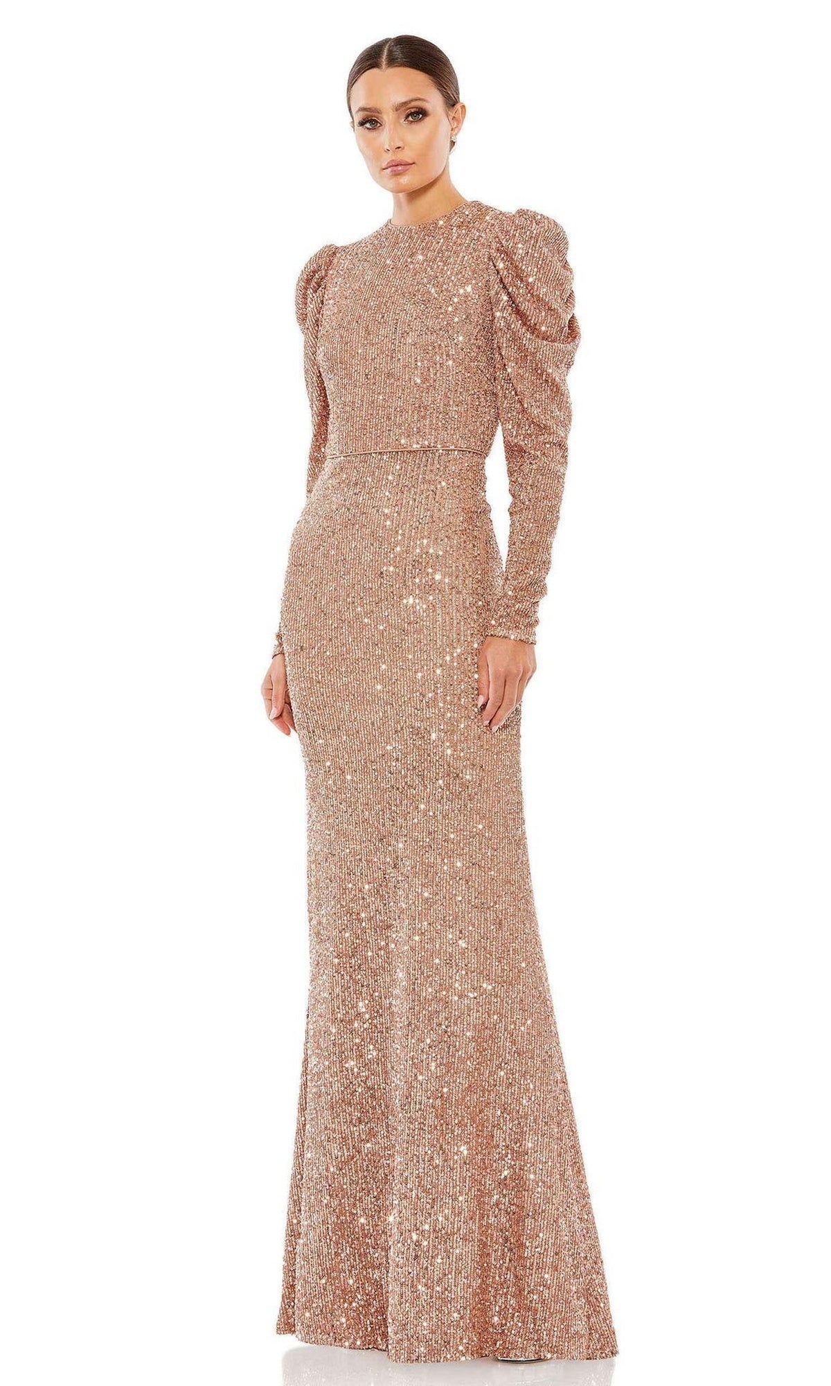 A woman wears the Mac Duggal 26692 Long-Sleeve Sequin Formal Dress with a fitted waist and puffed shoulders, standing against a white background.