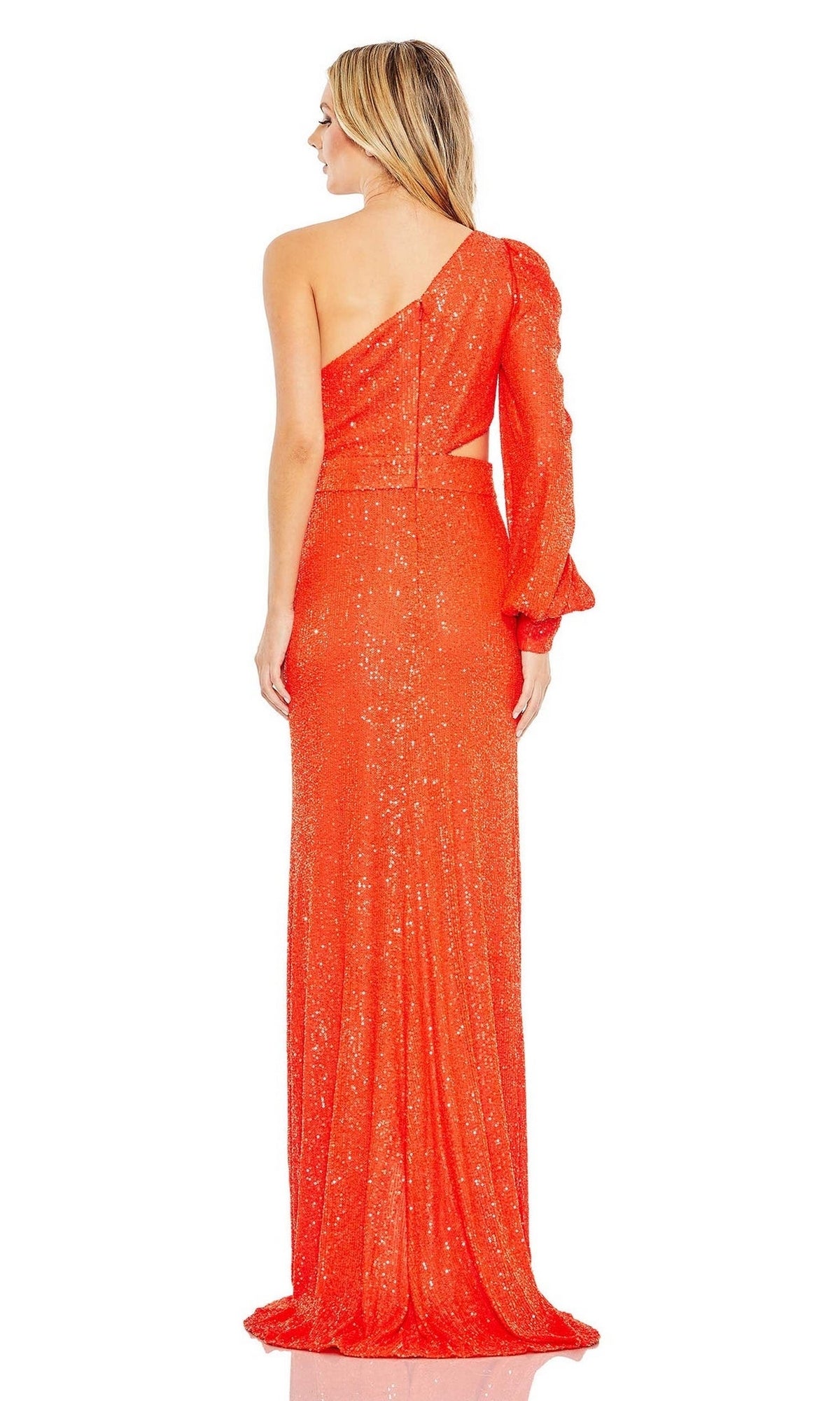 A woman faces away, wearing the Mac Duggal 26730 Cut-Out Long Sequin Formal Dress in bright orange, featuring a single full sleeve and a side cutout.