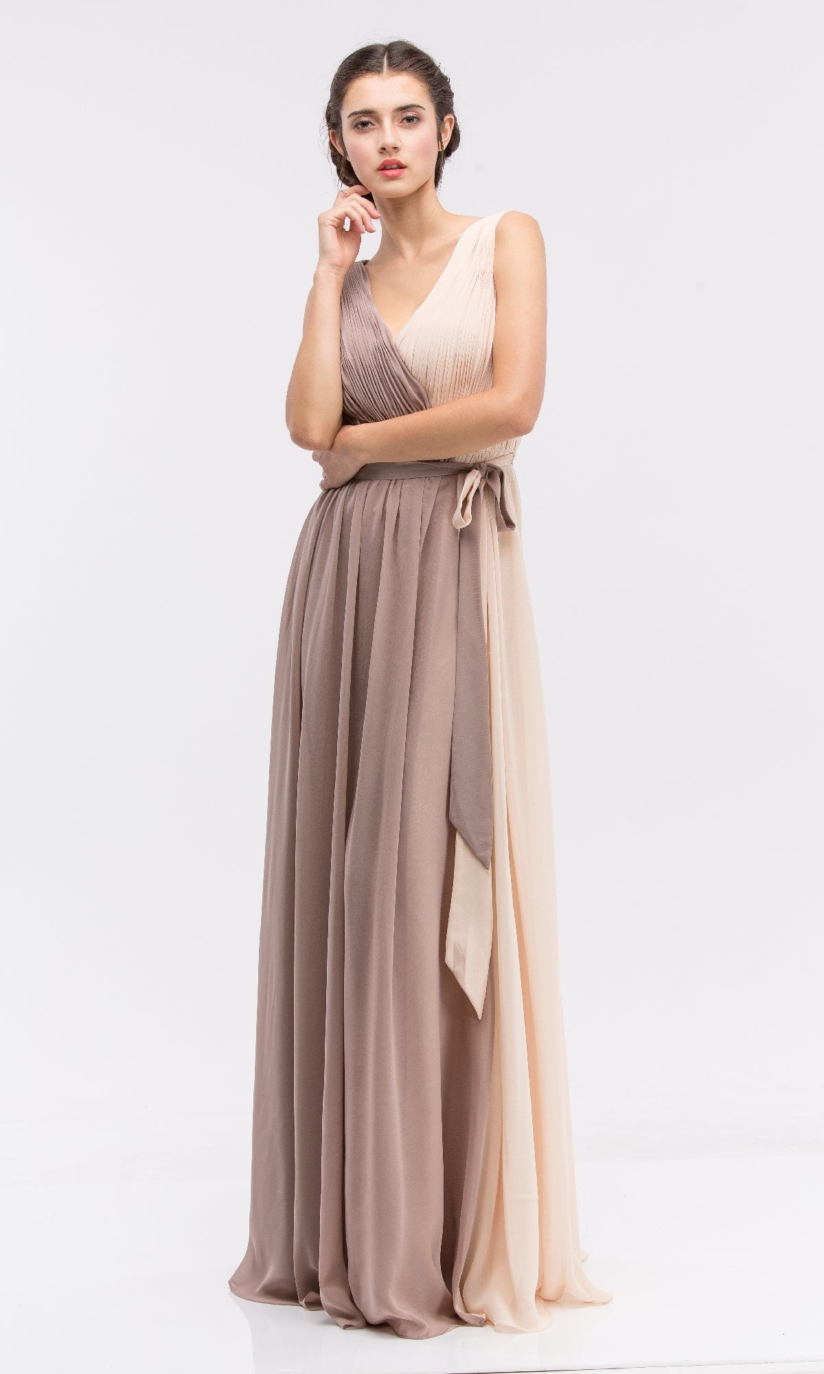 A woman models the Eureka 2711, a sleeveless two-toned beige and brown long chiffon formal dress, standing against a plain white background.