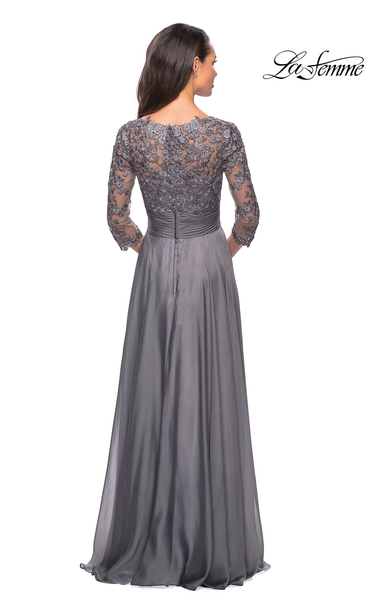 Back view of the grey chiffon La Femme 27153 formal dress, featuring a lace bodice, three-quarter length sleeves, and a pleated waistband.