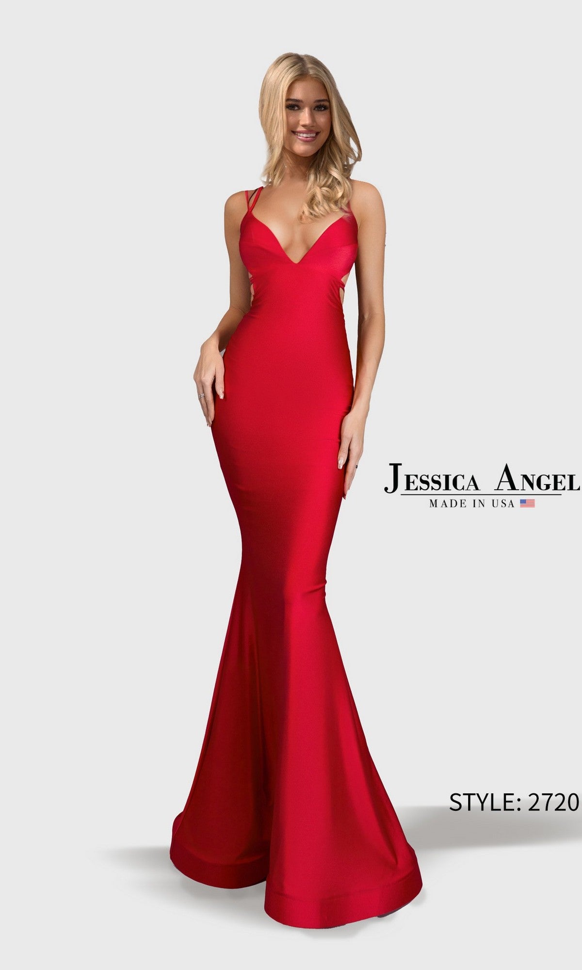 Woman in a fitted, floor-length red Long Prom Dress: Jessica Angel 2720. This sleeveless gown has thin straps and an elegant mermaid silhouette.