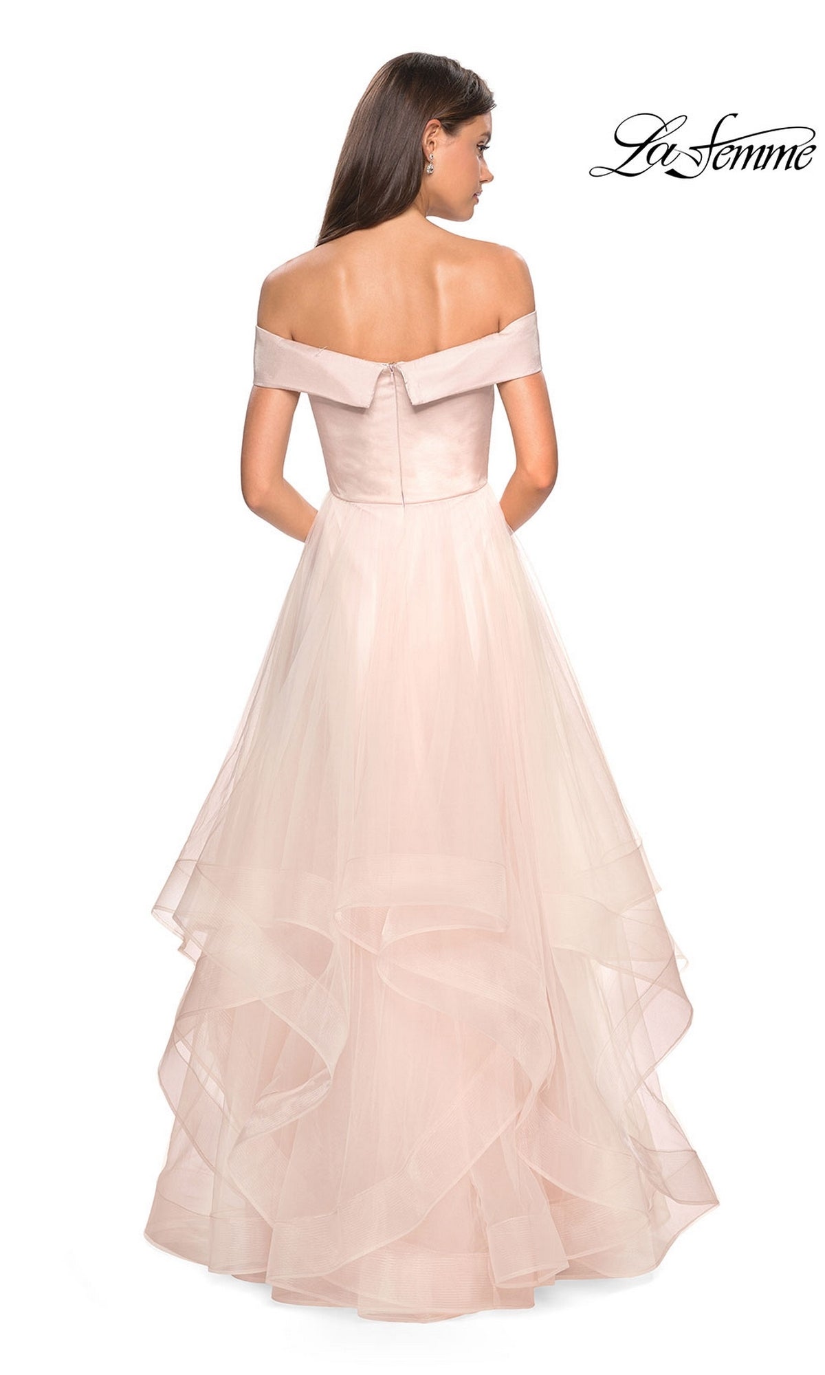 Woman wearing the La Femme Off-Shoulder Long Tiered Prom Dress 27224, featuring a blush hue, fitted bodice, layered tulle skirt, and off-the-shoulder neckline, shown from the back.