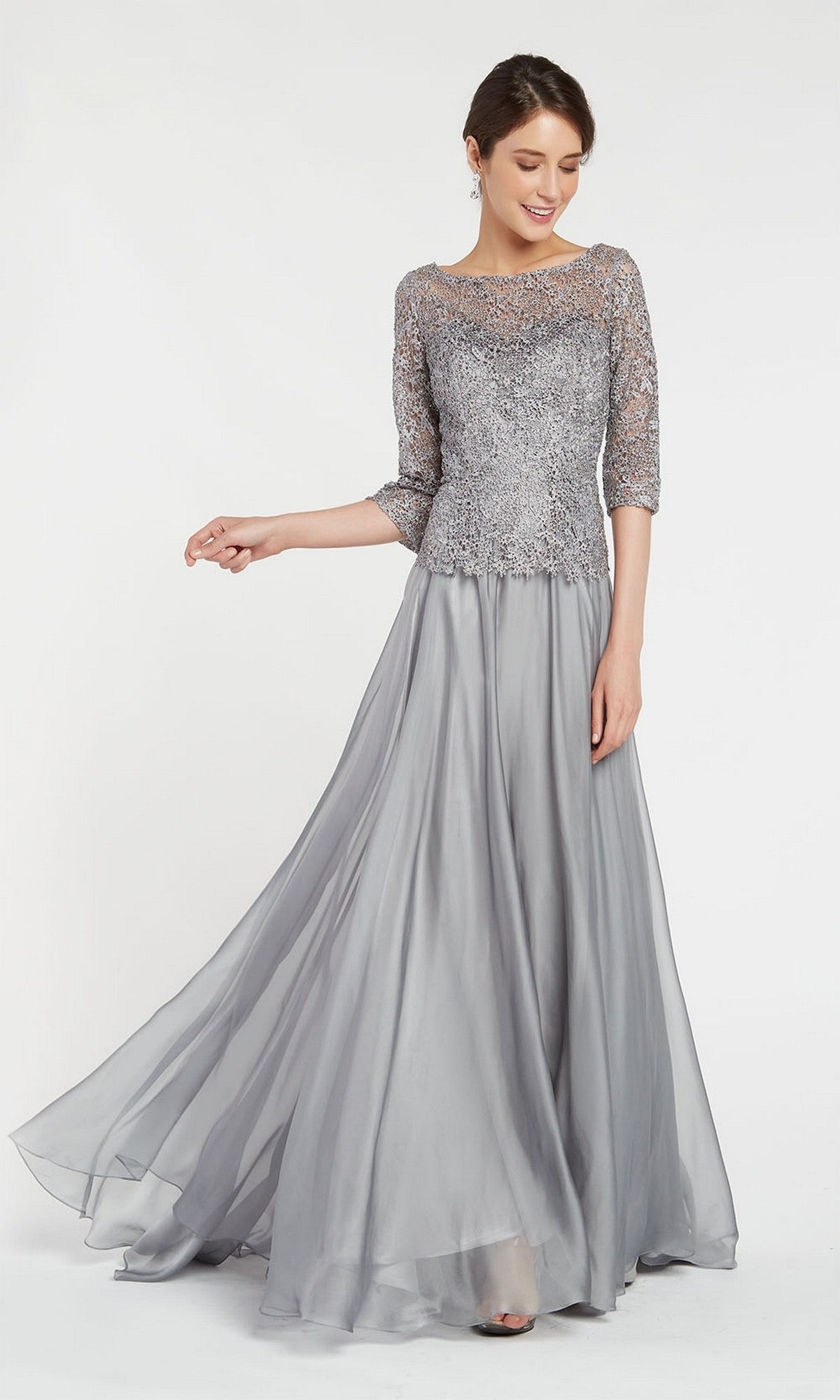 A woman in the Alyce 27251 long formal dress features a pewter lace bodice with three-quarter sleeves and a flowing satin skirt—an elegant look for the mother of the bride or any formal event.