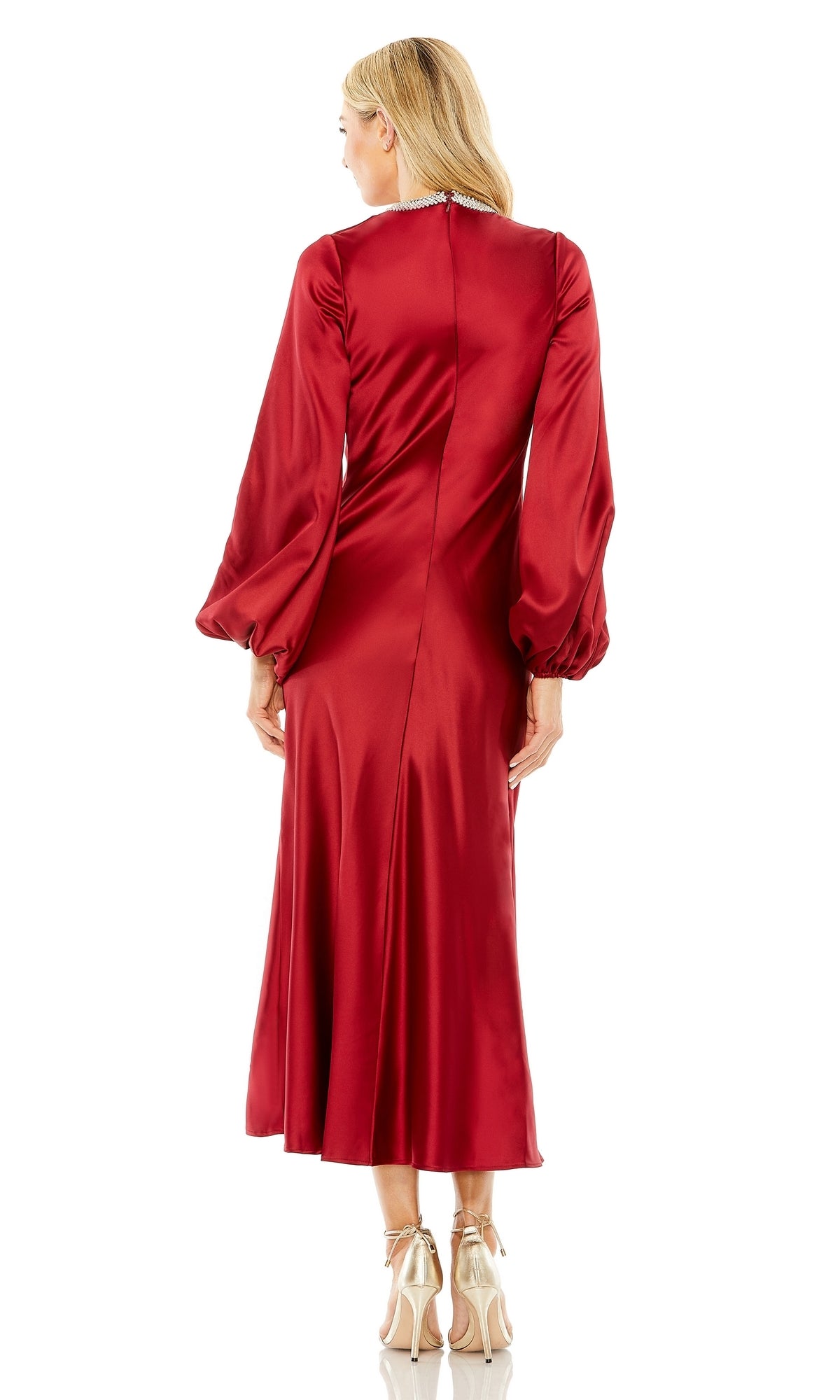 A woman faces away wearing the Mac Duggal 27350 Modest Midi Wedding Guest Dress, featuring long sleeves, a fitted waist, a beaded high neckline, and beige high-heeled shoes.