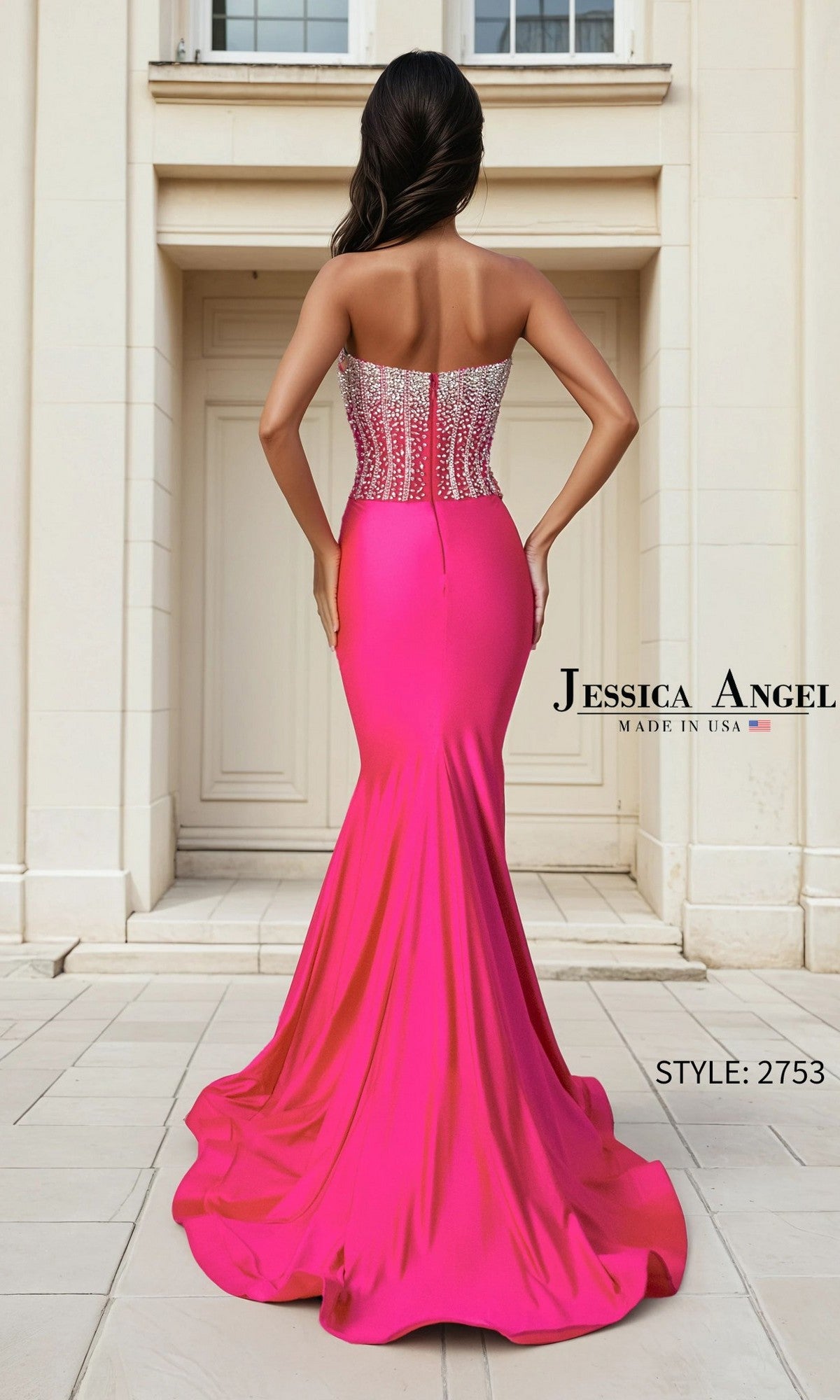 A woman stands with her back to the camera in front of a building entrance, wearing the Jessica Angel 2753 Long Prom Dress— a pink strapless mermaid gown with crystal-embellished corset. Text: