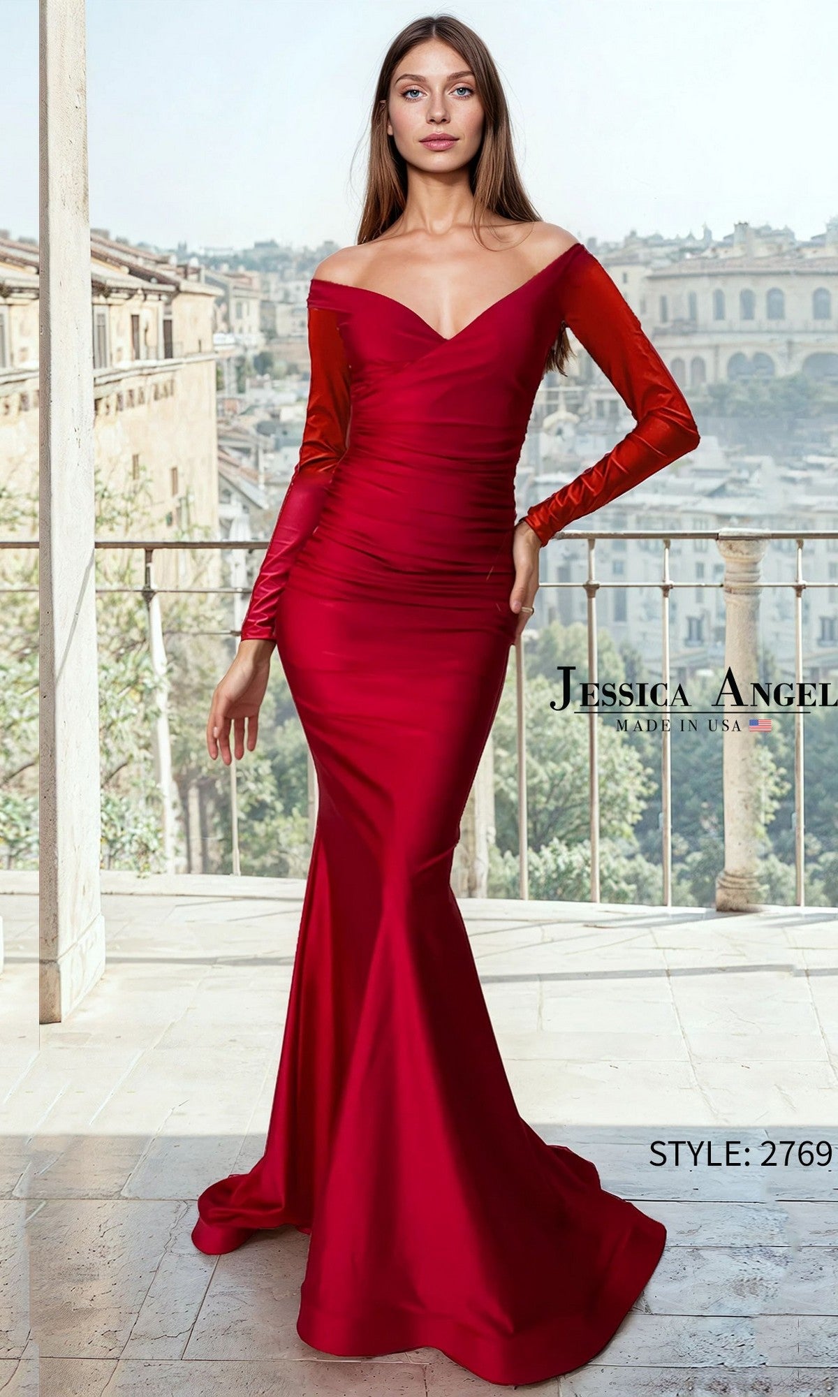 A woman in a fitted, off-the-shoulder satin mermaid long prom dress (Jessica Angel 2769) in dark red with long sleeves stands on a balcony, European cityscape behind her.