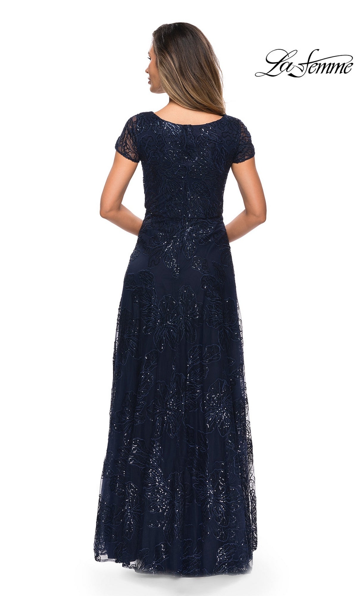 Back view of the Long Formal Dress: La Femme 27837, a floor-length navy blue gown featuring short sleeves and an all-over floral sequin pattern.