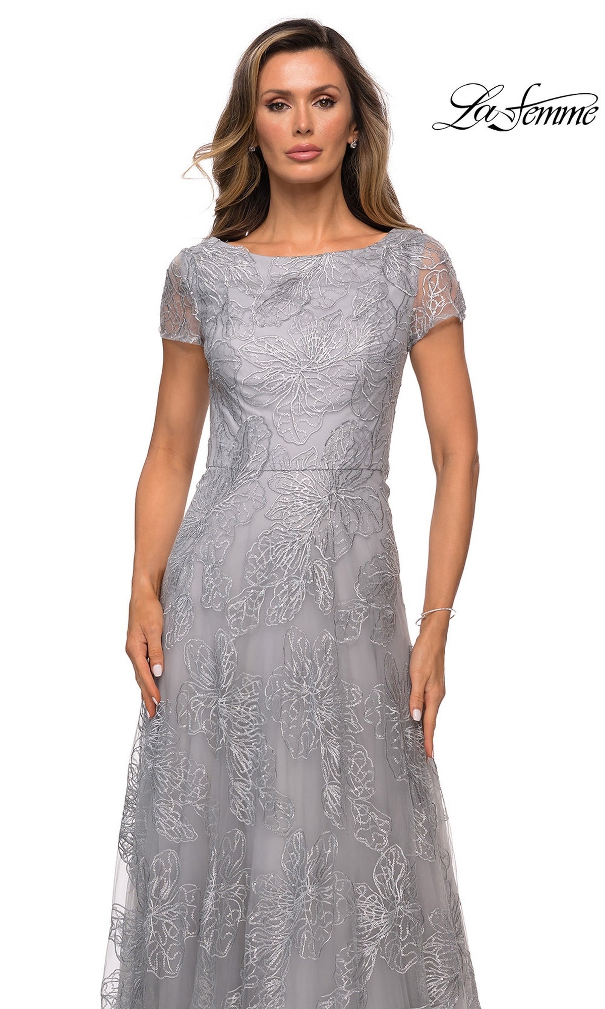 La Femme 27837 grey short-sleeved formal gown with a boat neckline and silver floral sequin lace embroidery.