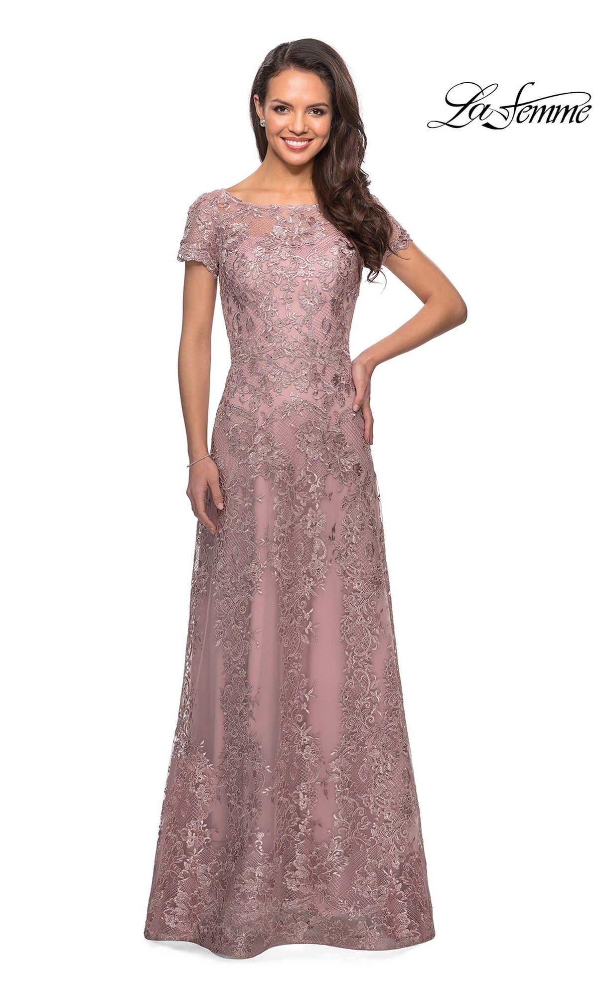 A woman poses smiling with one hand on her hip, wearing the Long Formal Dress: La Femme 27935 in mauve. The La Femme logo is shown in the top right corner.
