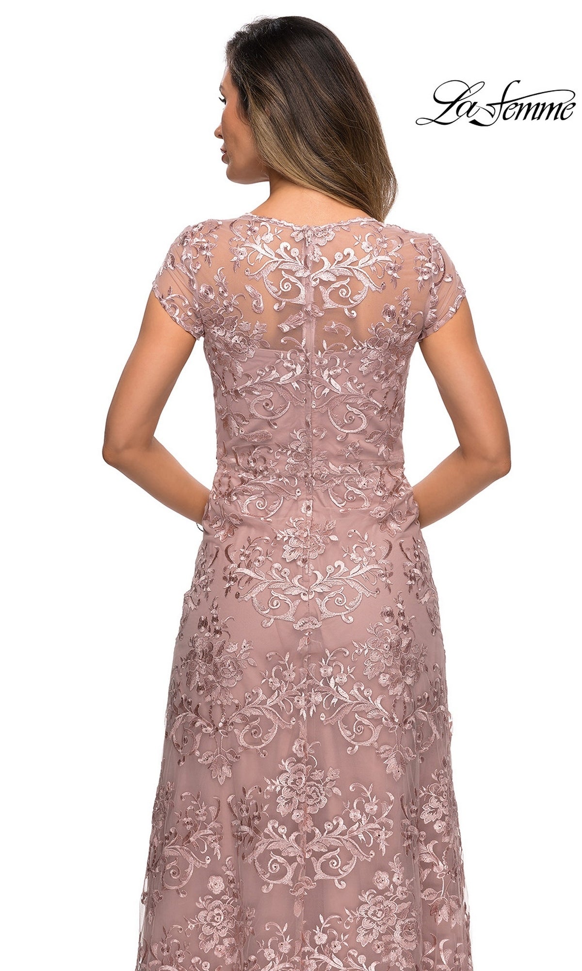 Back view of a dusty rose, floor-length La Femme 27951 gown featuring short cap sleeves and an intricate floral lace overlay.