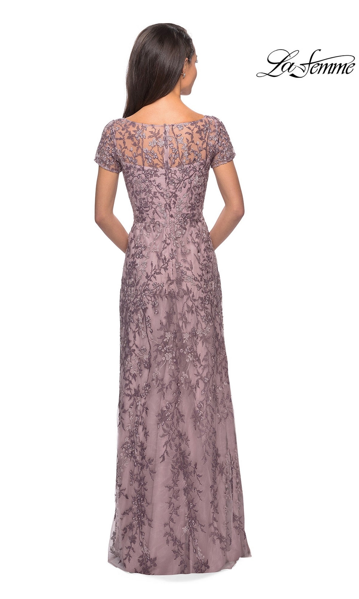 Woman in floor-length mauve lace Long Formal Dress: La Femme 27956, short sleeves, floral beading, back view. “La Femme” logo top right.