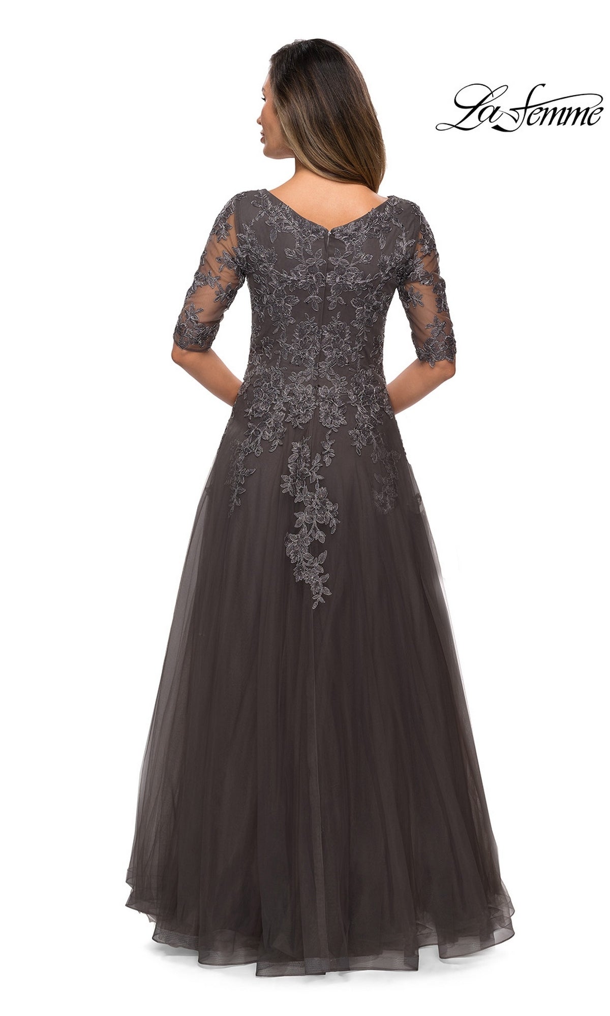 Back view of the charcoal grey Long Formal Dress: La Femme 27993, featuring an A-line silhouette with three-quarter lace sleeves and floral embroidery extending down the bodice.