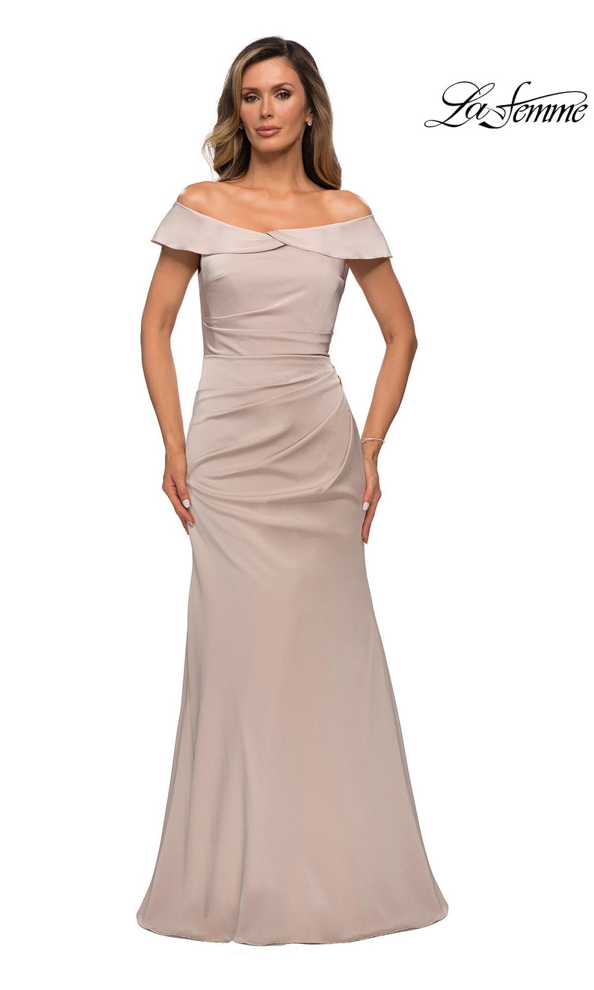 Woman in a champagne Long Formal Dress: La Femme 28110 with off-the-shoulder, ruched details, and trumpet silhouette poses against a white background. La Femme logo top right.