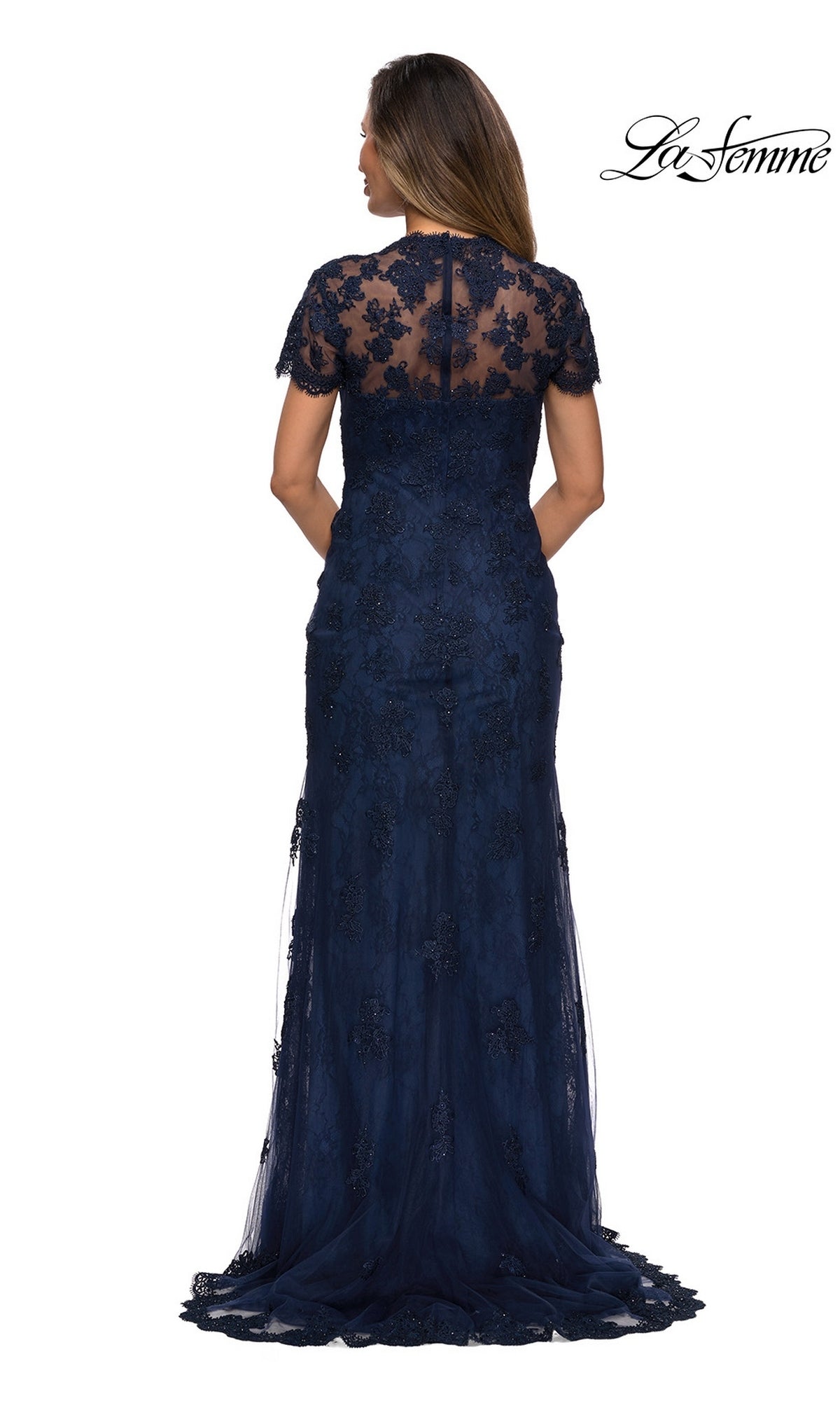 Back view of the Long Formal Dress: La Femme 28195, a floor-length navy blue scalloped lace gown with short sleeves and a sheer neckline.