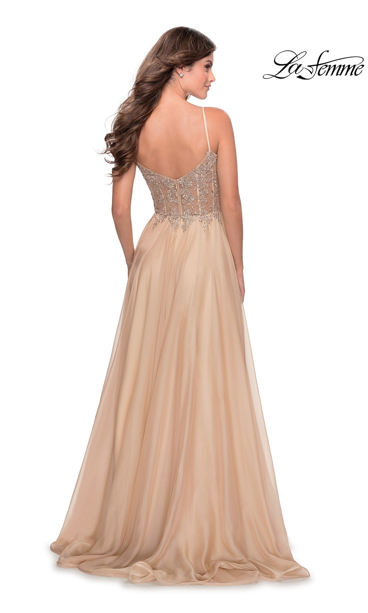 Back view of the beige La Femme 28543 floor-length evening gown, featuring a sheer lace bodice, spaghetti straps, and an A-line skirt.