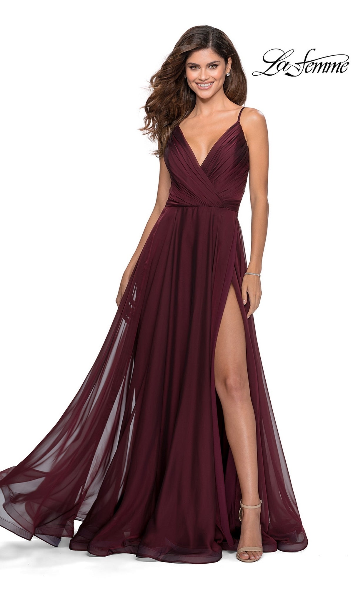 Long Prom Dress: La Femme 28611 in garnet, a floor-length V-neck gown featuring a pleated surplice bodice and an A-line skirt with a high side slit.