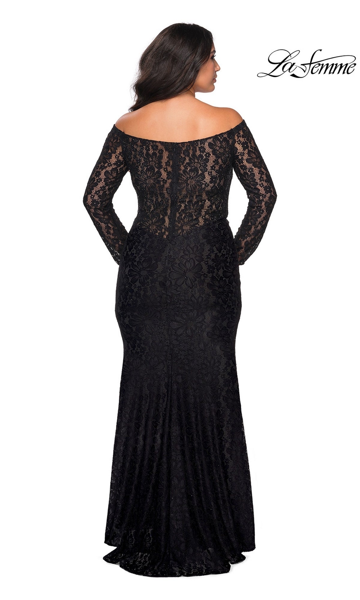 Back view of a woman wearing the Long Plus-Size Prom Dress: La Femme 28945, a black, long-sleeved, off-the-shoulder lace dress with a floor-length skirt.