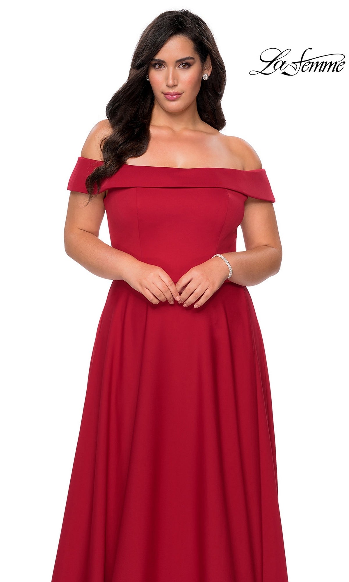 Woman in the Long Plus-Size Prom Dress: La Femme 29007, a floor-length red off-the-shoulder gown with fitted bodice, stands against a white background; “La Femme” logo top right.