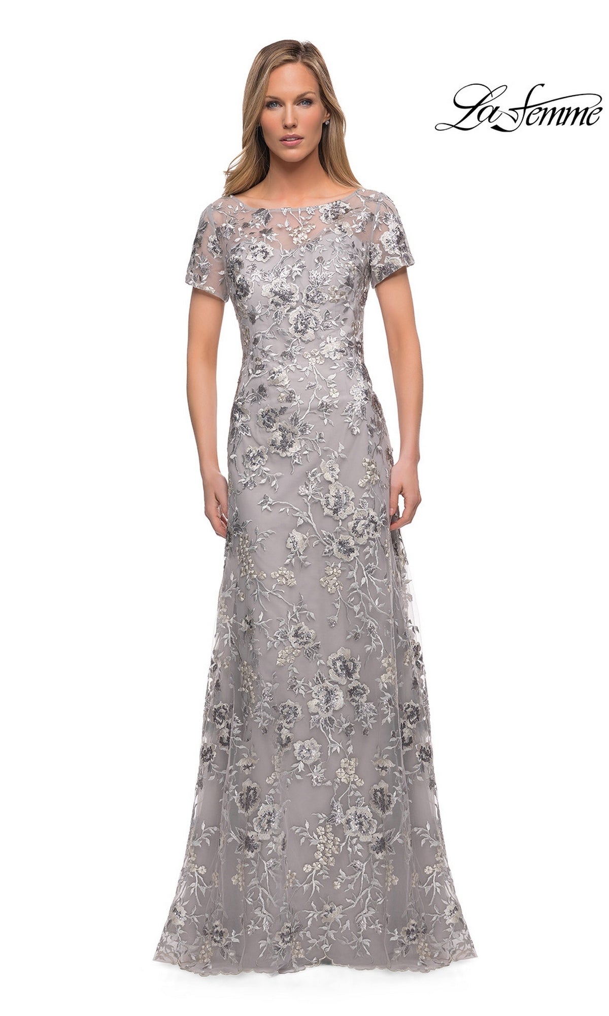 Long Formal Dress: La Femme 29281 in silver, a floor-length formal dress with short sleeves, a sheer neckline, and all-over floral embroidery.